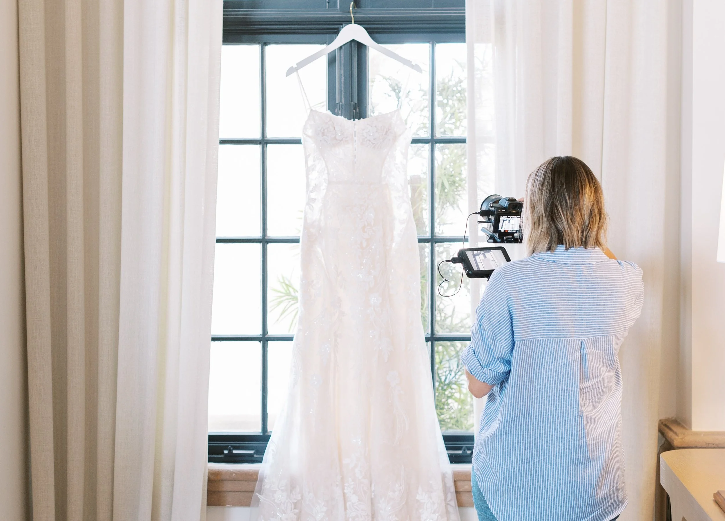 wedding dress photo with a warm and bright edit.