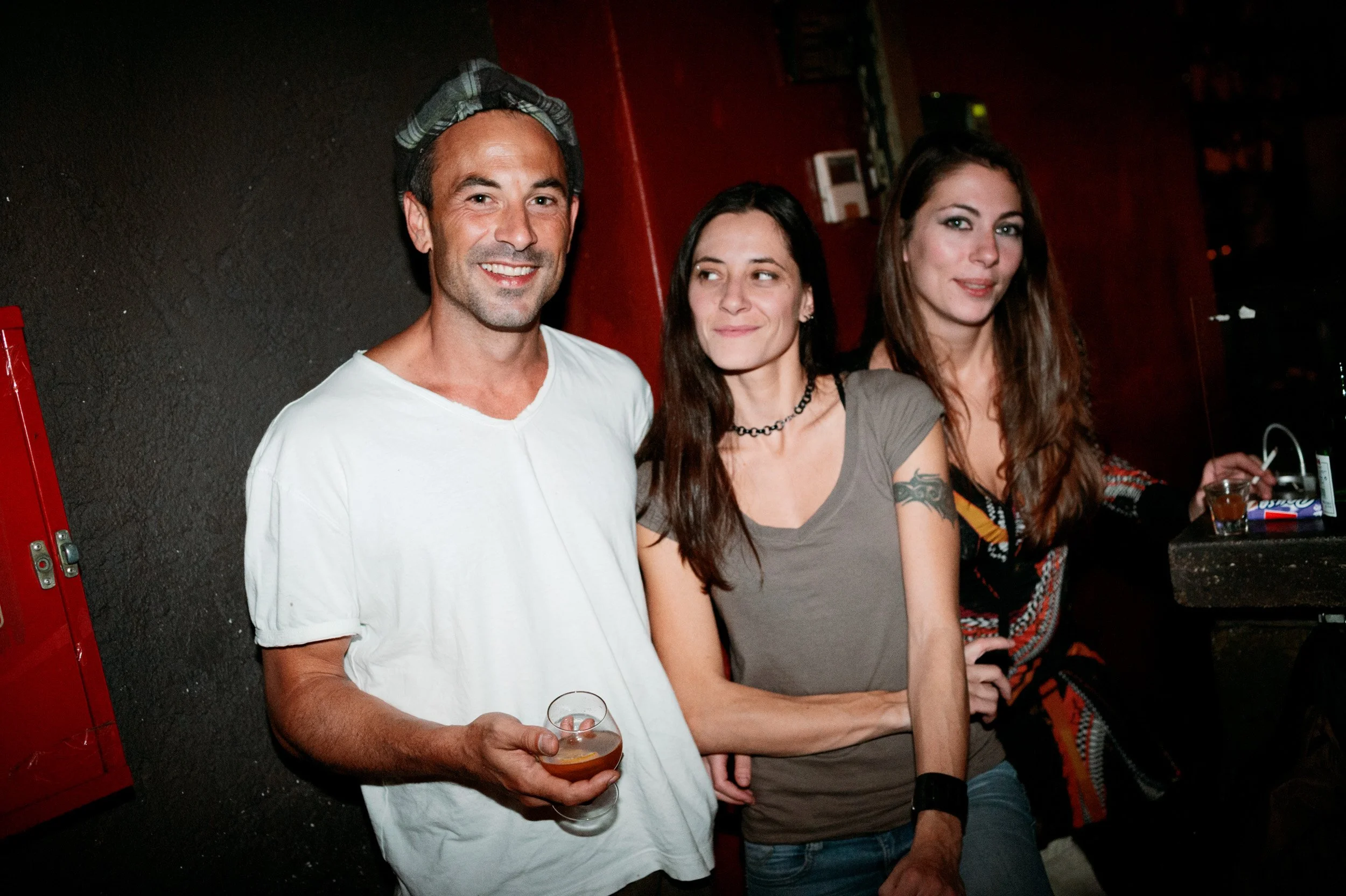  Nikolas Vrontissis (left), owner of the Hoxton bar in Gazi district, along with Katerina and Elena, djs at the bar. 