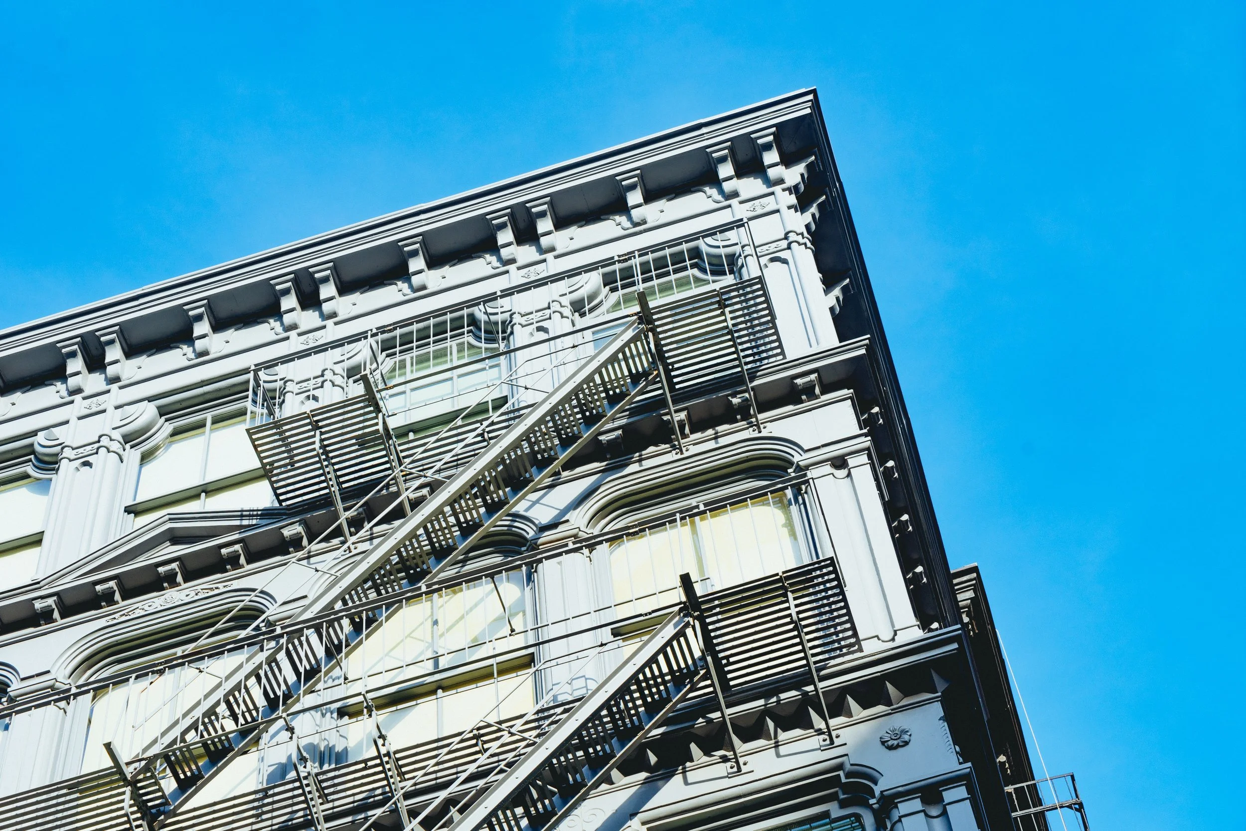 Forget climbing the career ladder, careers are a New York fire escape ladder. Photo credit: Dan Gold