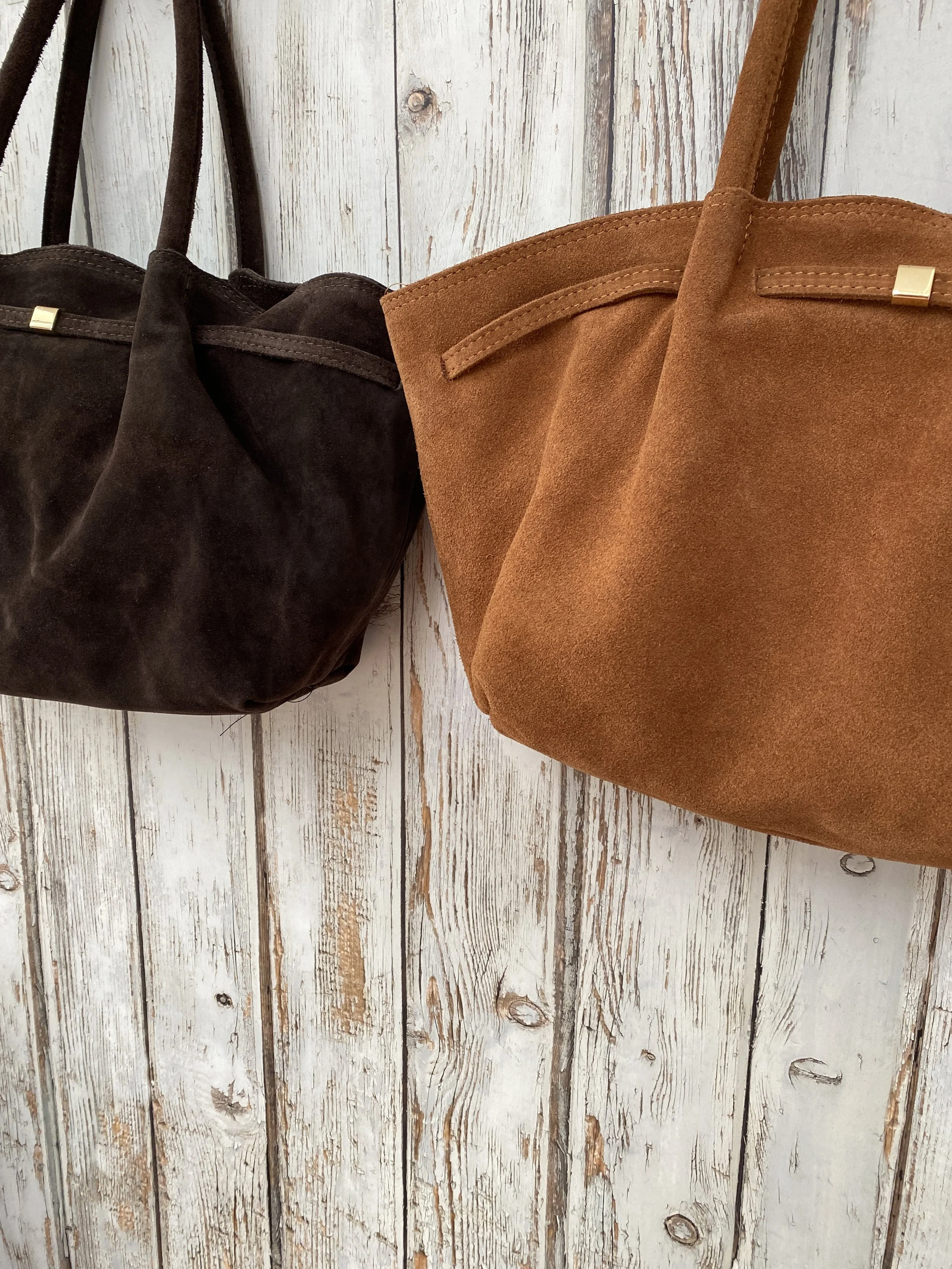 Fifi suede tote bag is a gorgeous statement piece for those who crave a blend of luxury and practicality.