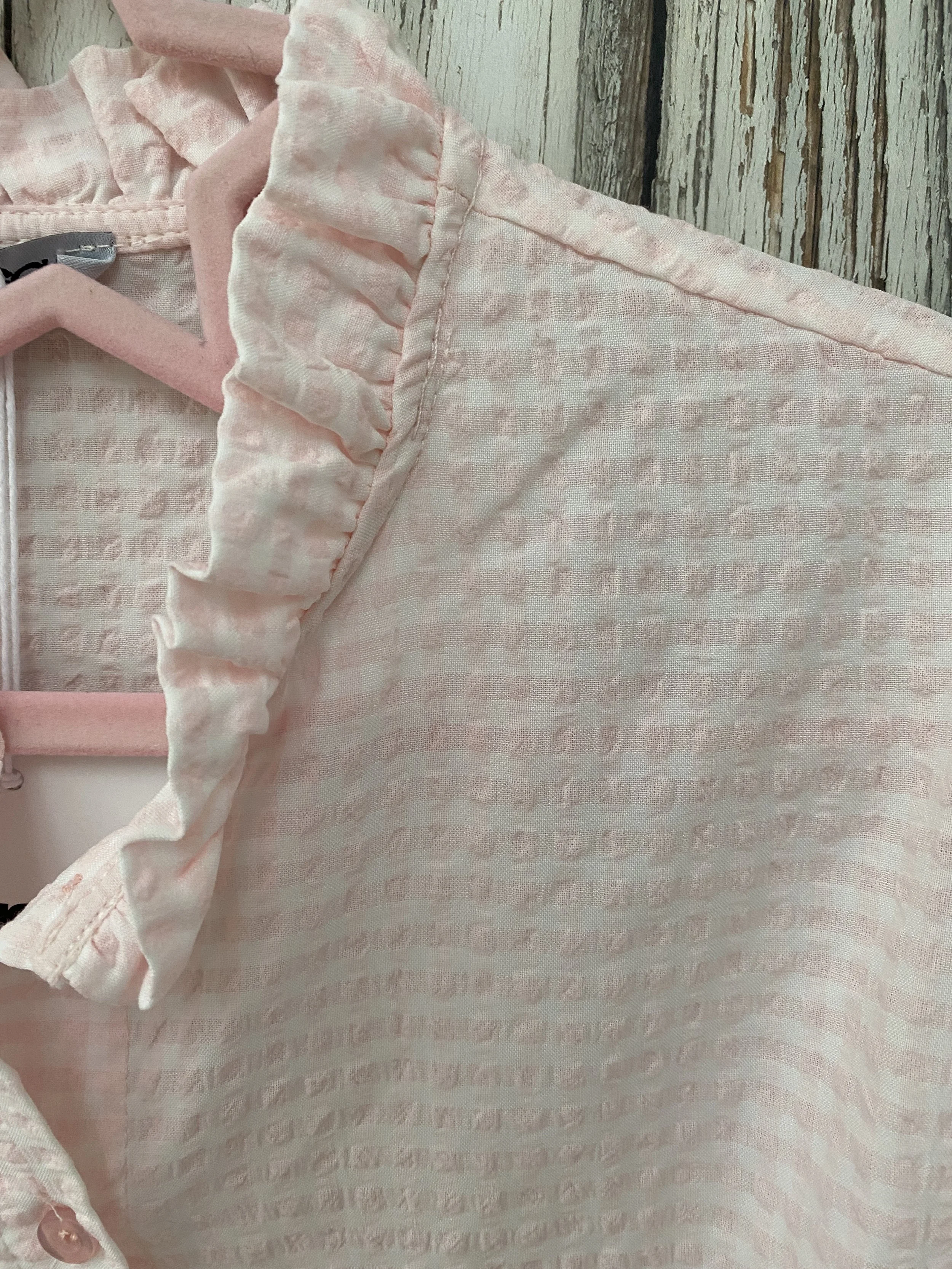 ruffle collar details on pink gingham shirt