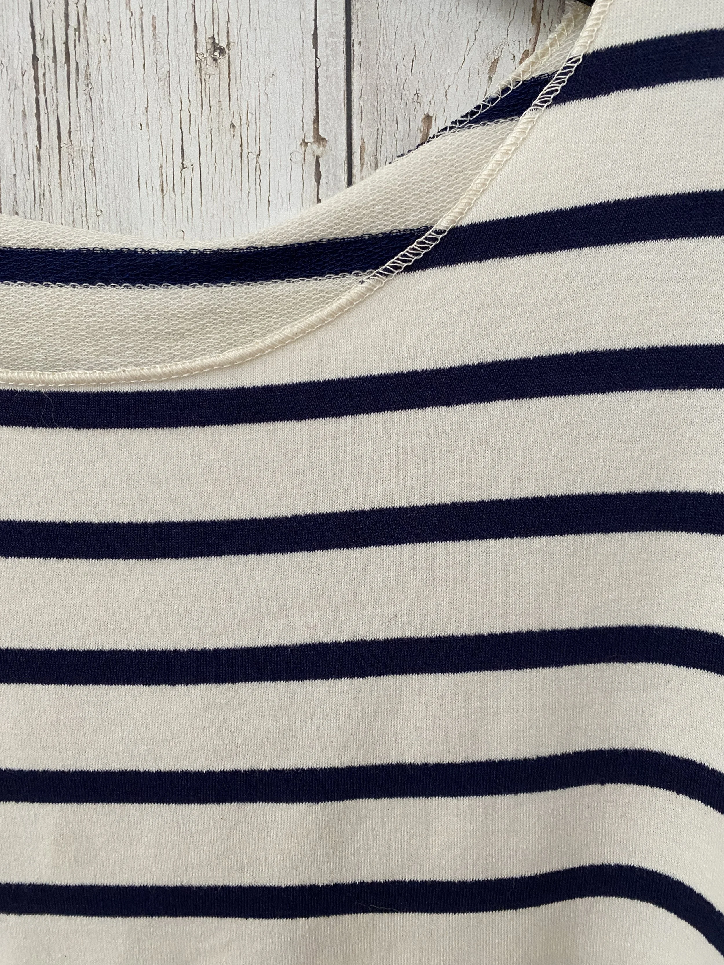 neckline of navy and cream stripe top