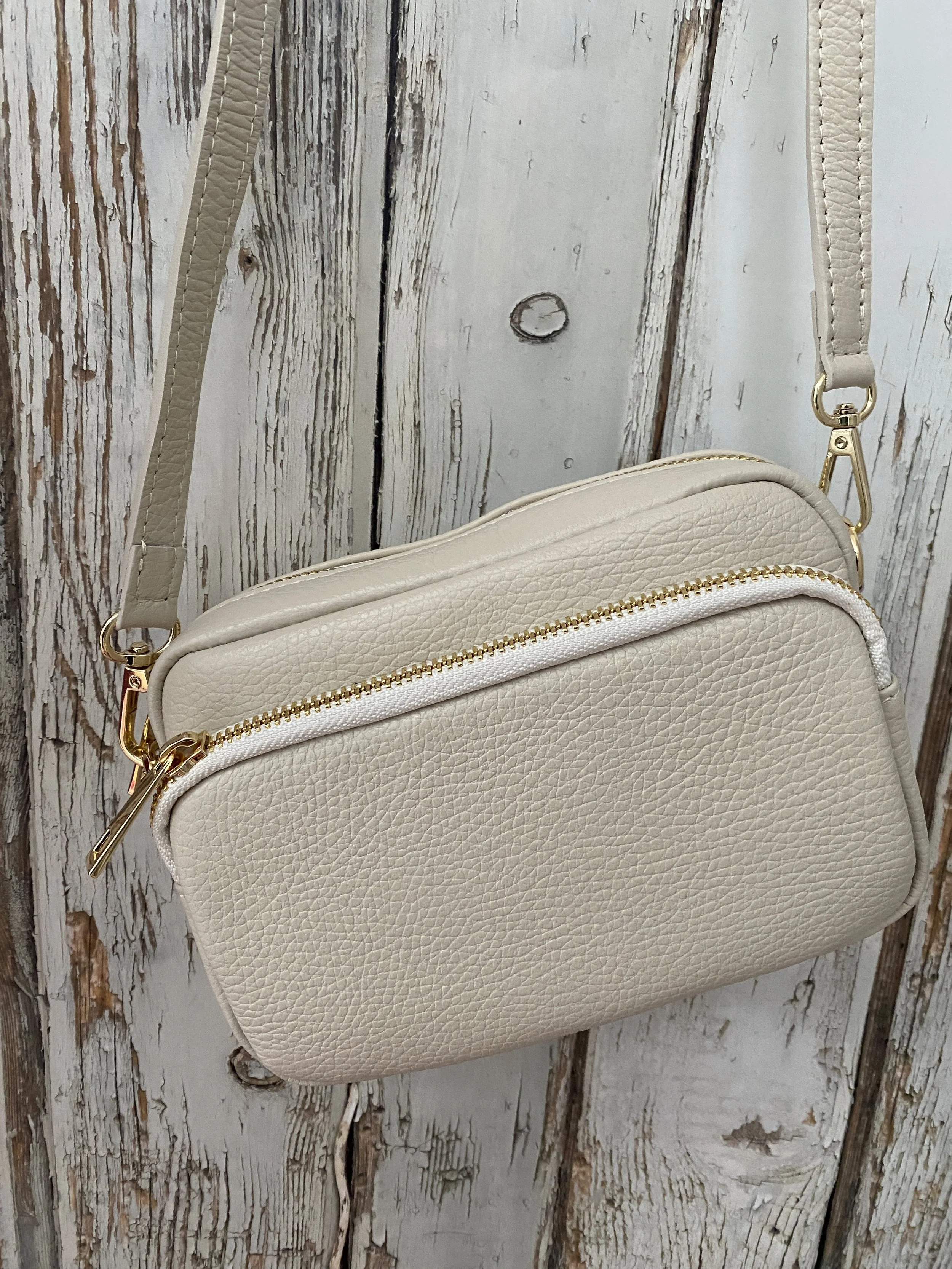 Cream double zip cross body bag