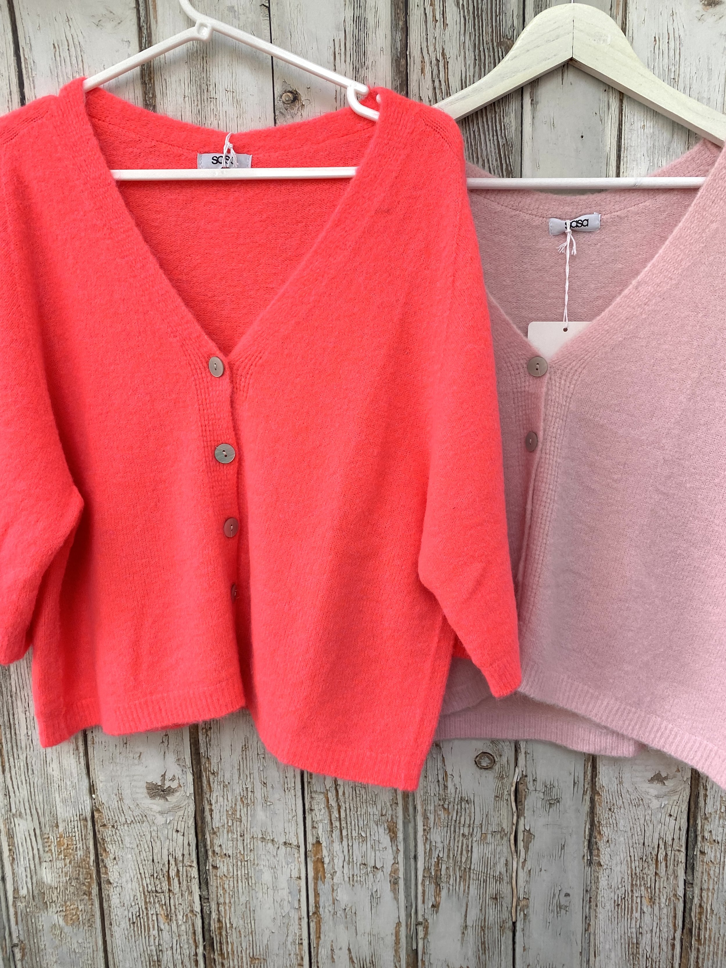 Neon coral and pale pink v neck cardigans