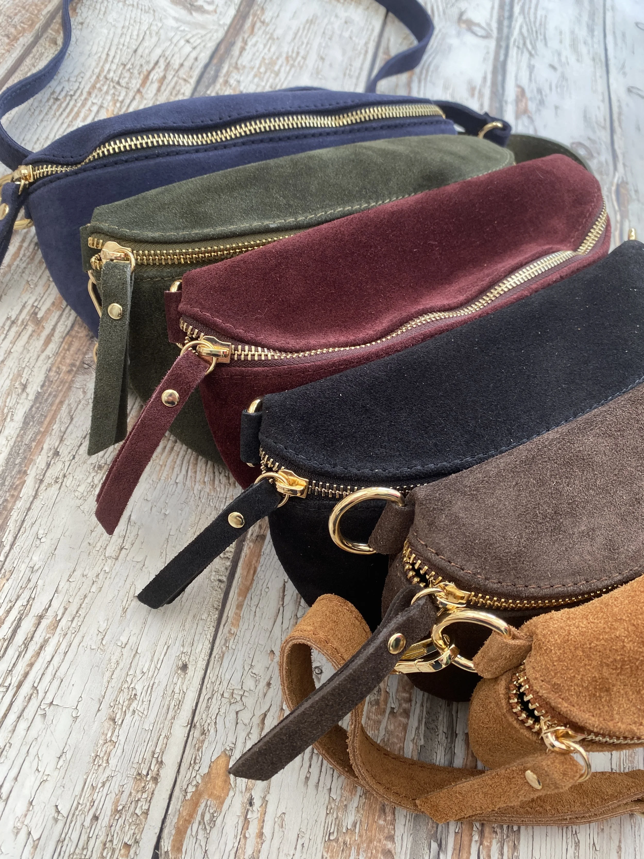 selection of suede bags