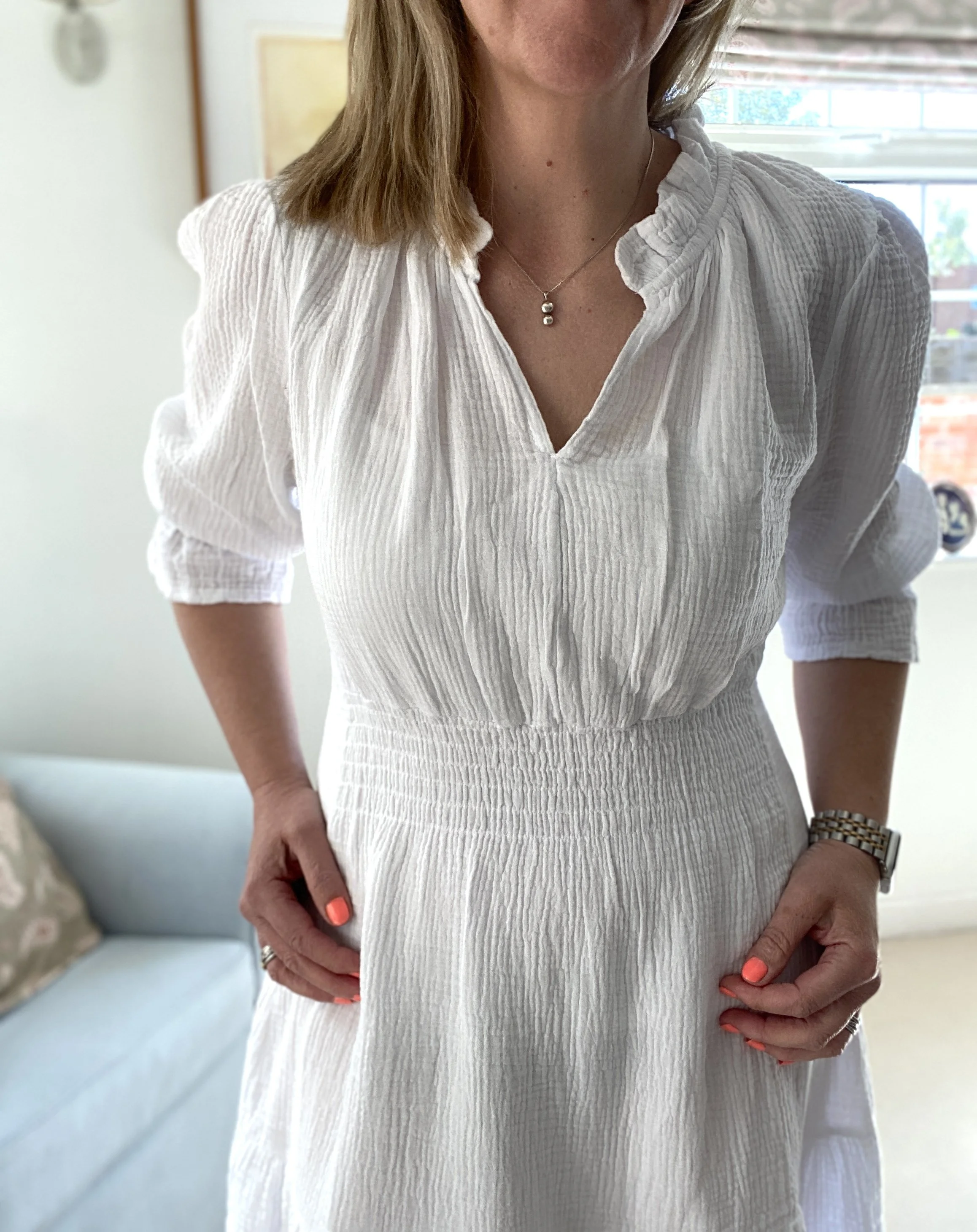 white cotton dress worn on model