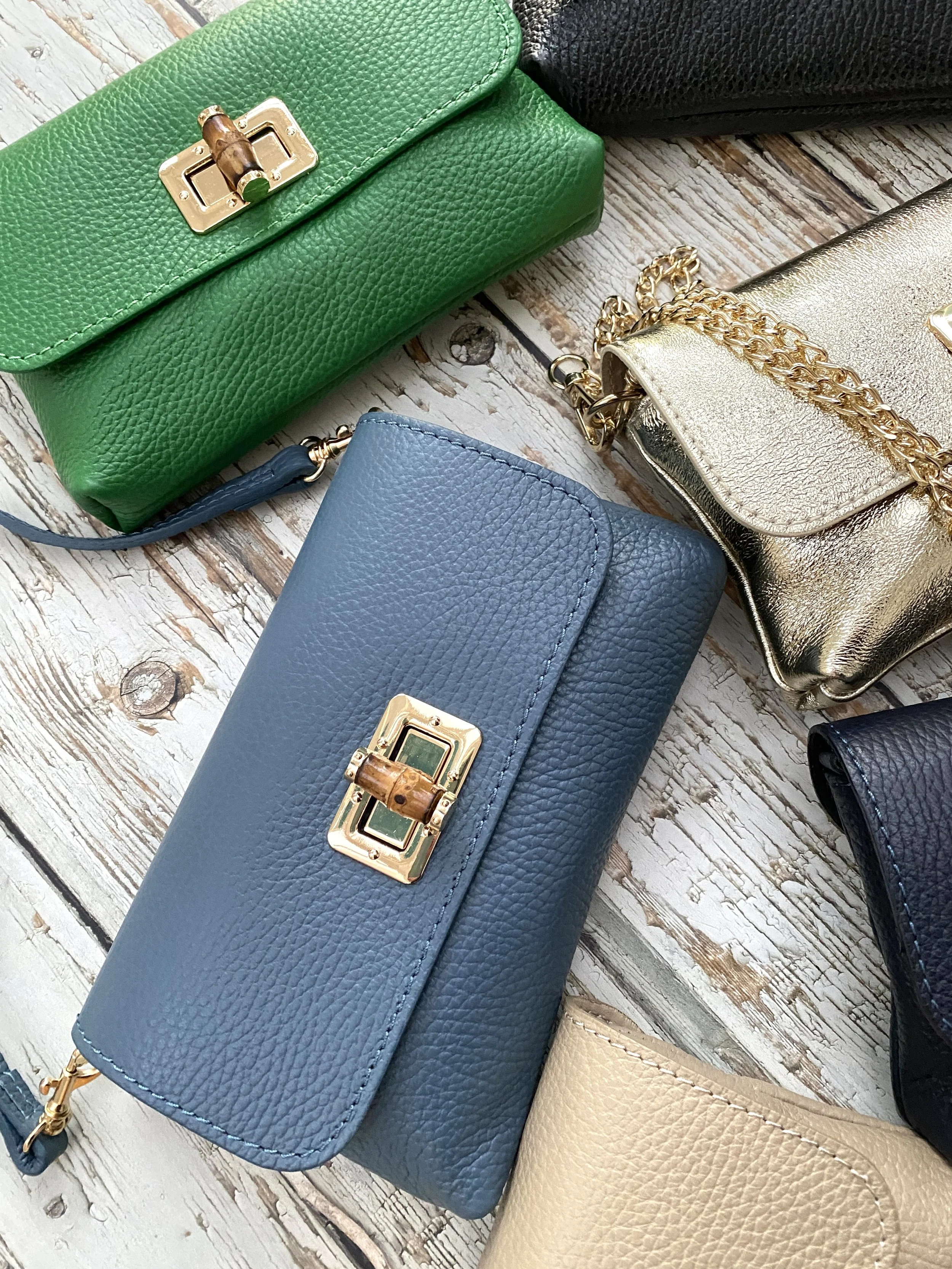 different colour small leather bags