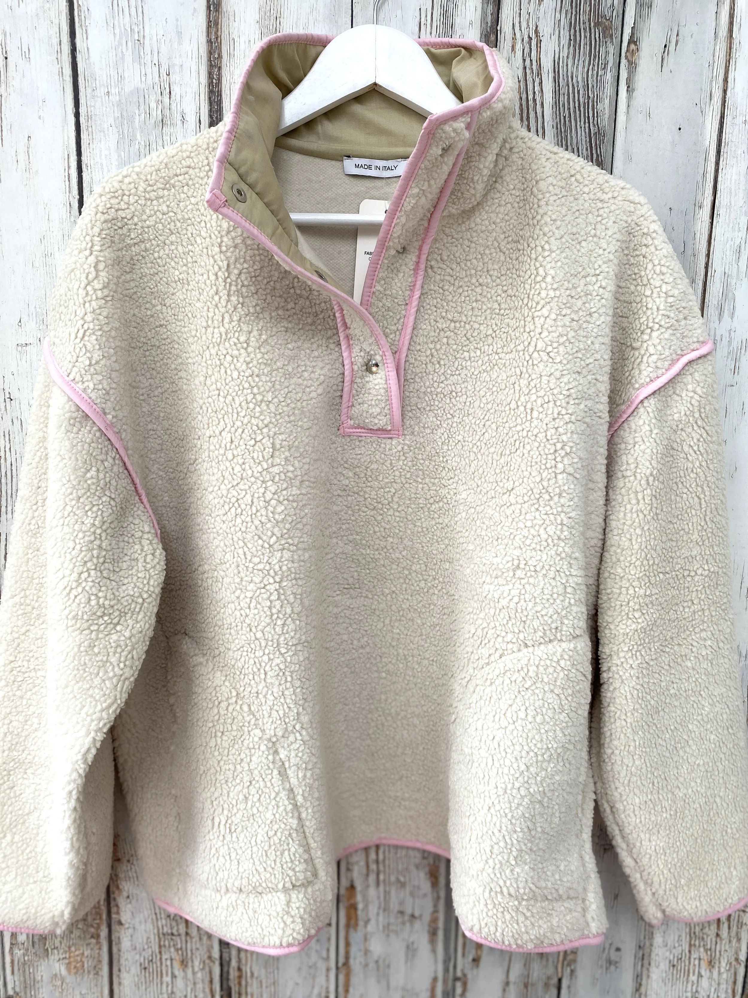 Beige and pink fleece pullover with high neck