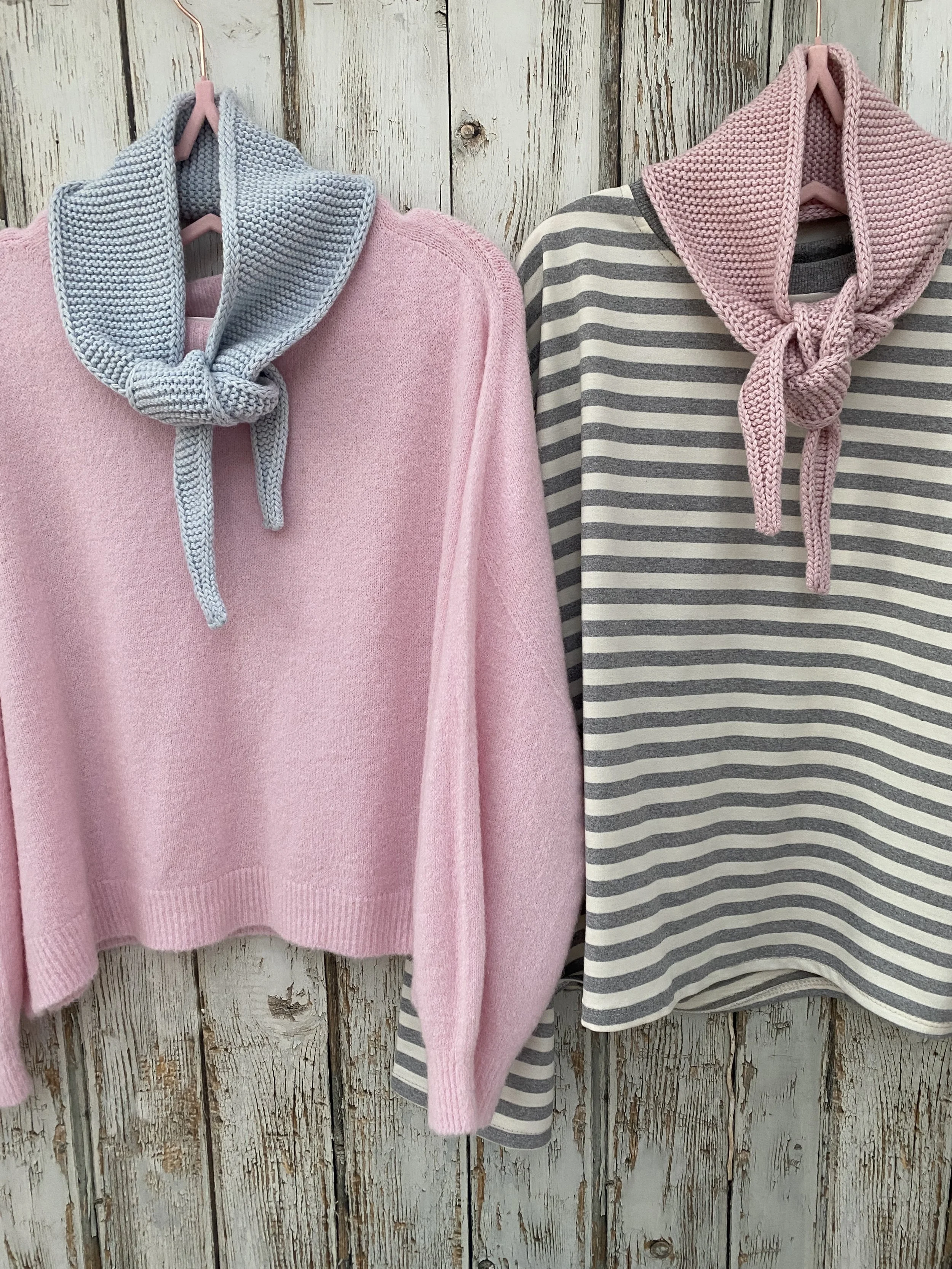 pale blue neck scarf with pink jumper