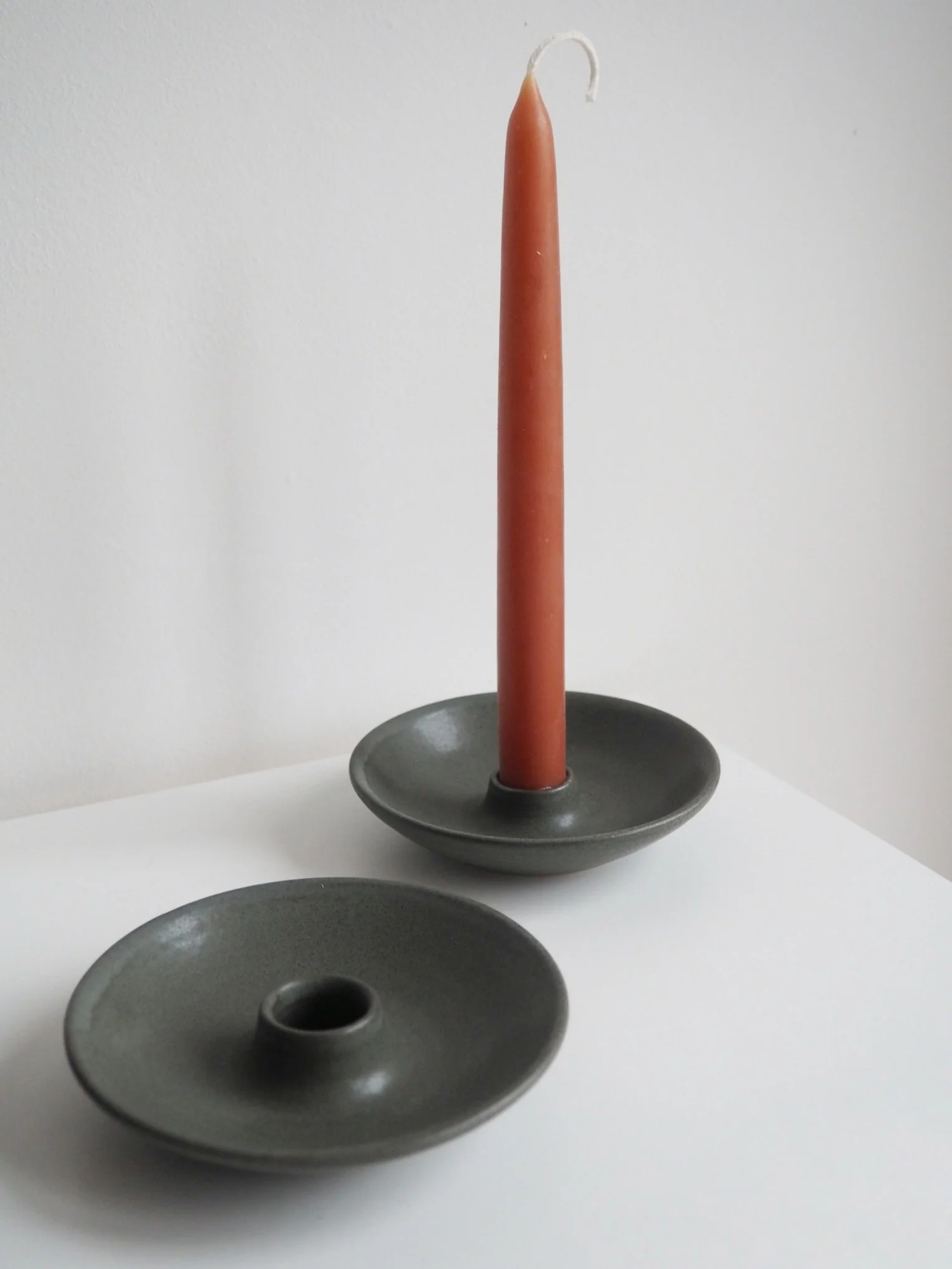 Handmade charcoal glazed candle holders.jpeg
