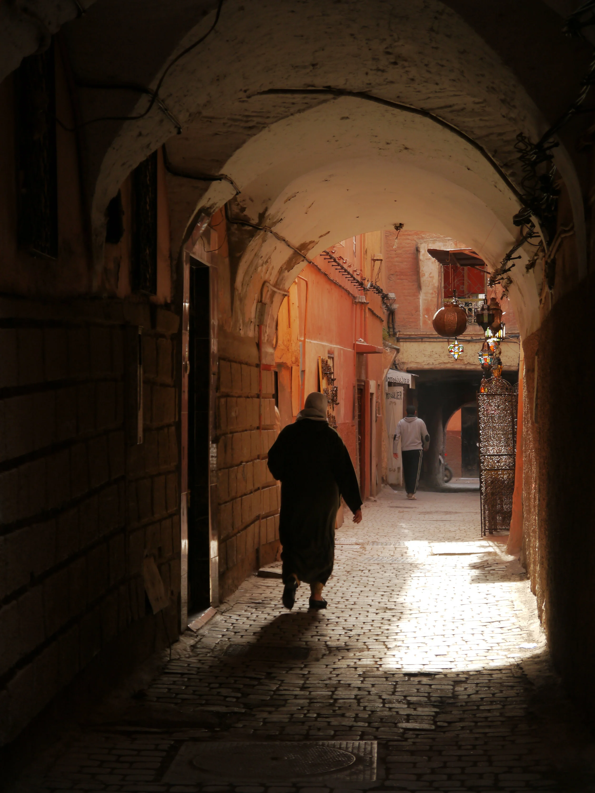 Narrow street in Marrakech - light and shade - cool and hot - terracotta