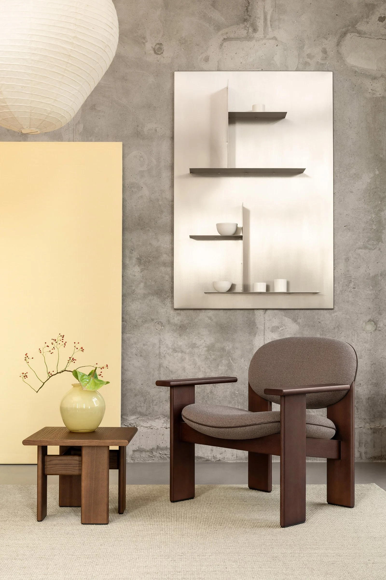 Contemporary lounge chairs crafted from solid ash and upholstered in varied textiles, demonstrating the collection’s flexibility and craftsmanship.