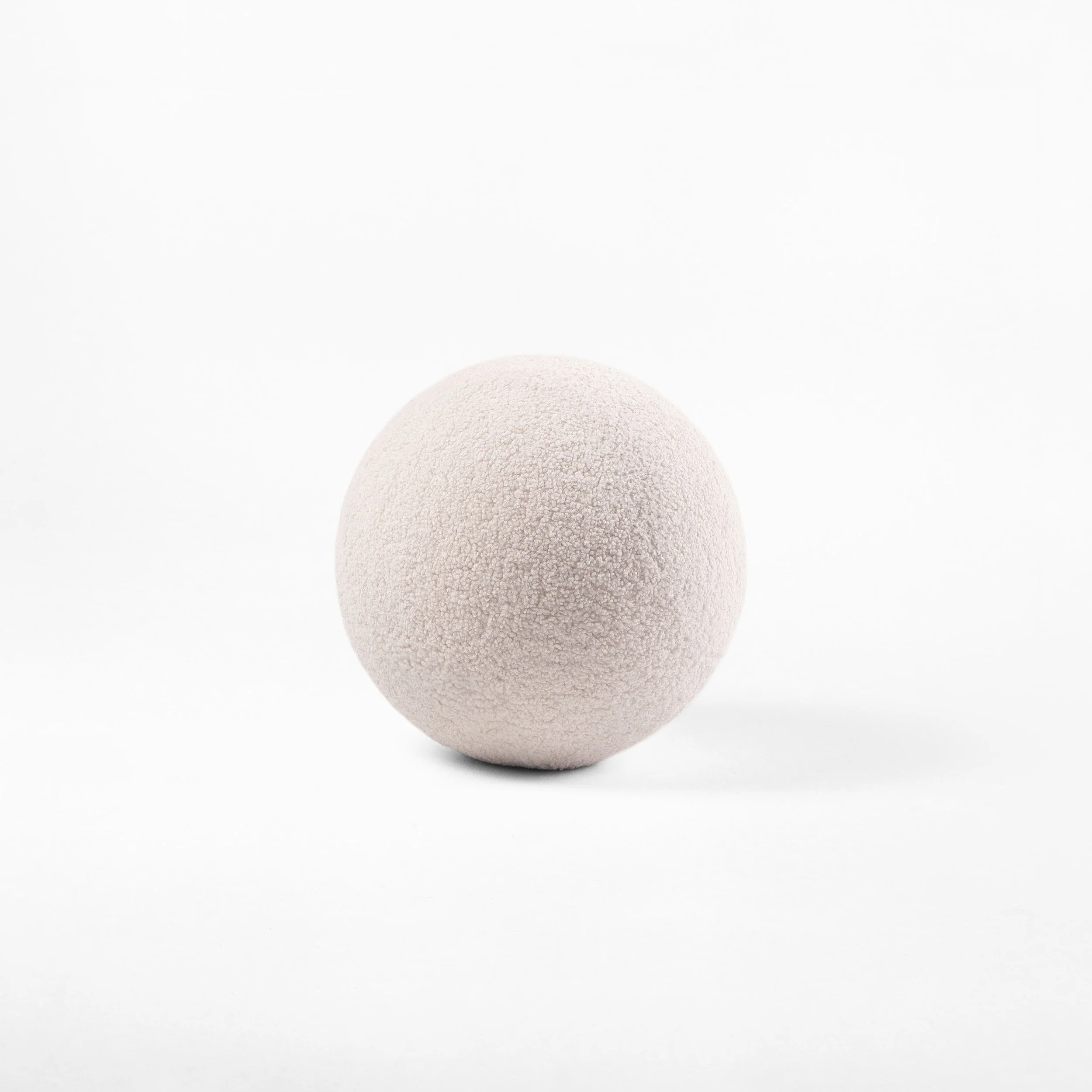 Fluffy-Baby-Spheric-Ottoman-in-Medo-Faux-Sheepskin 1.jpg