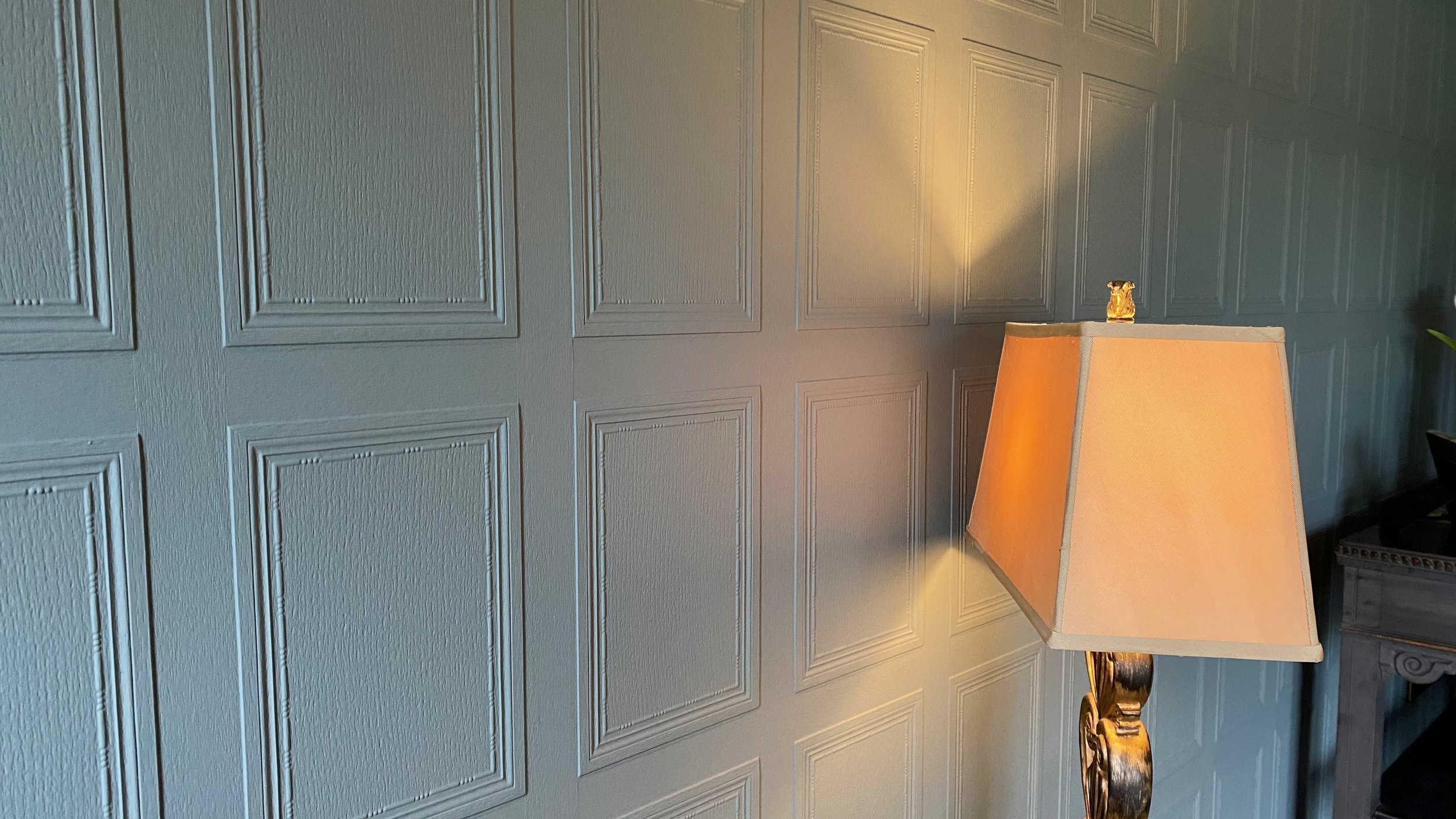 A close up of the finely grained wood effect of Lincrusta Georgian Panel design, installed by Frank Holmes