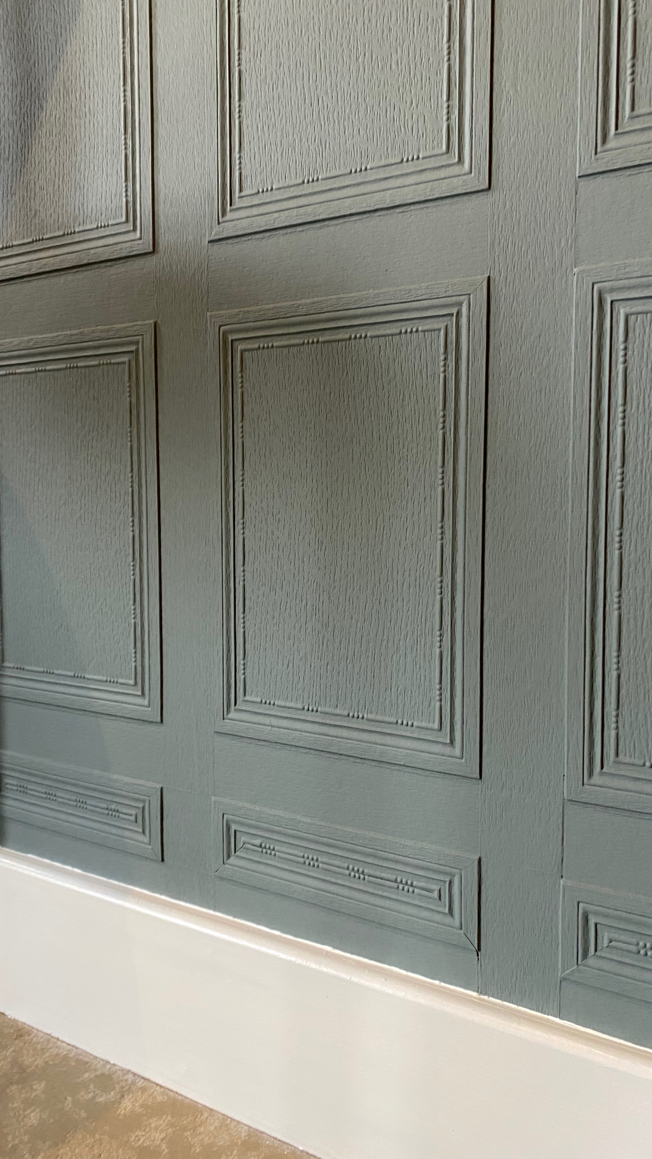 Lincrusta panels reduced in size at skirting level for an authentic panelled look