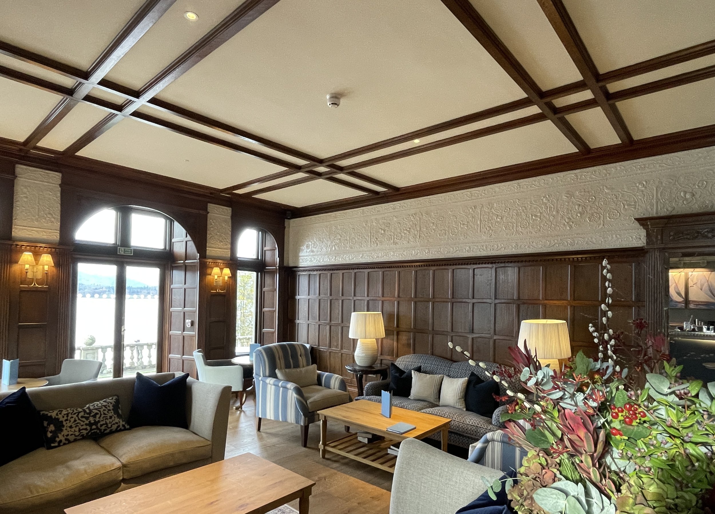Oak paneled lounge overlooking Lake Windermere at Langdale Chase Hotel
