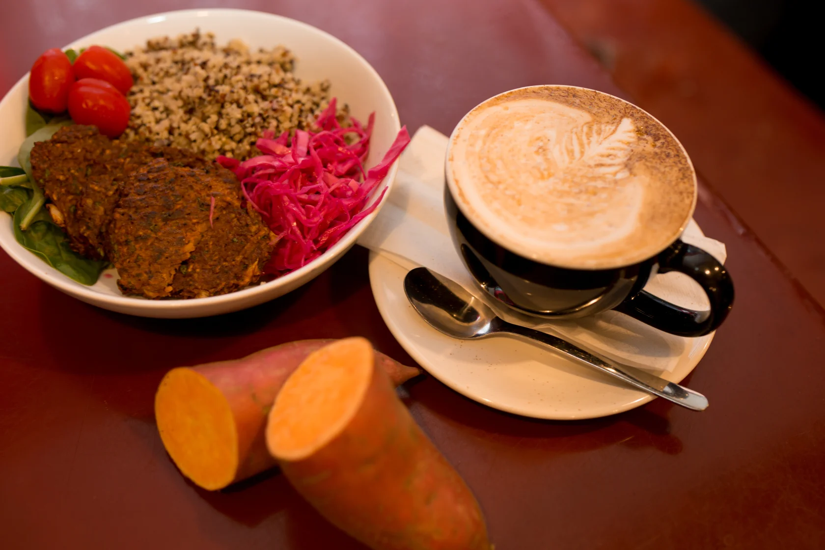 The Harvest Bowl , featured at Rabbit Dash, is spinach, quinoa, tomatoes, red cabbage and Sweet Potato Fritters with chipotle mayo! Pictured here with a toasted marshmallow latte.