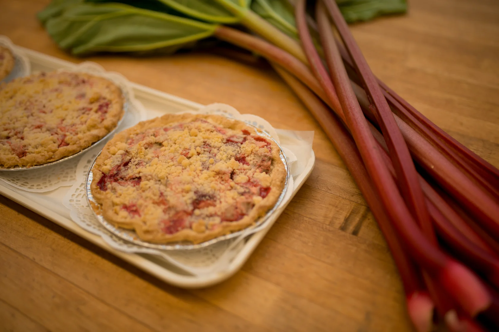 I love the tartness of rhubarb baked into squares, tarts, cakes and of course – pies!