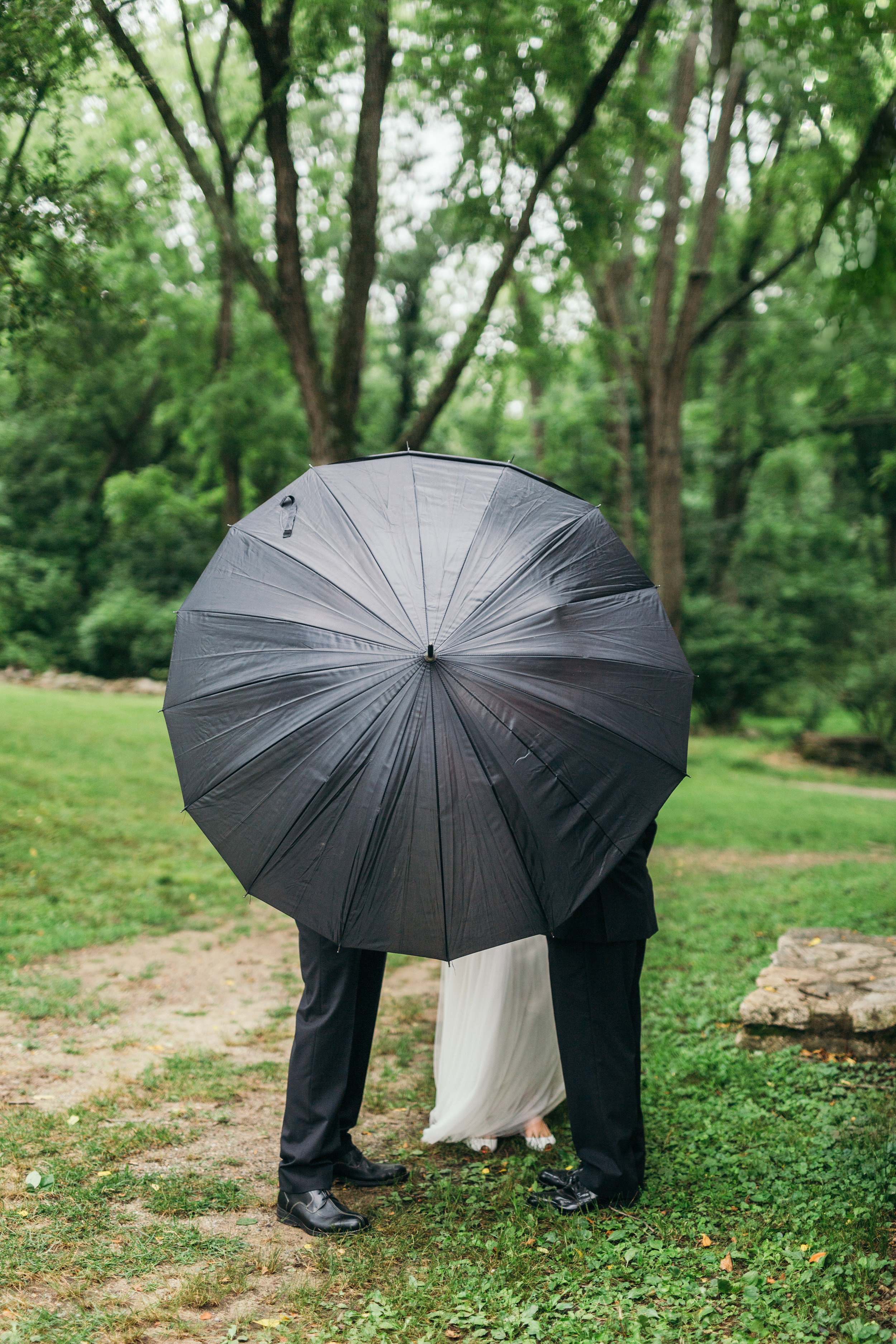 Waterloo Village Wedding with the Bride hiding behind an umbrella before walking down the aisle