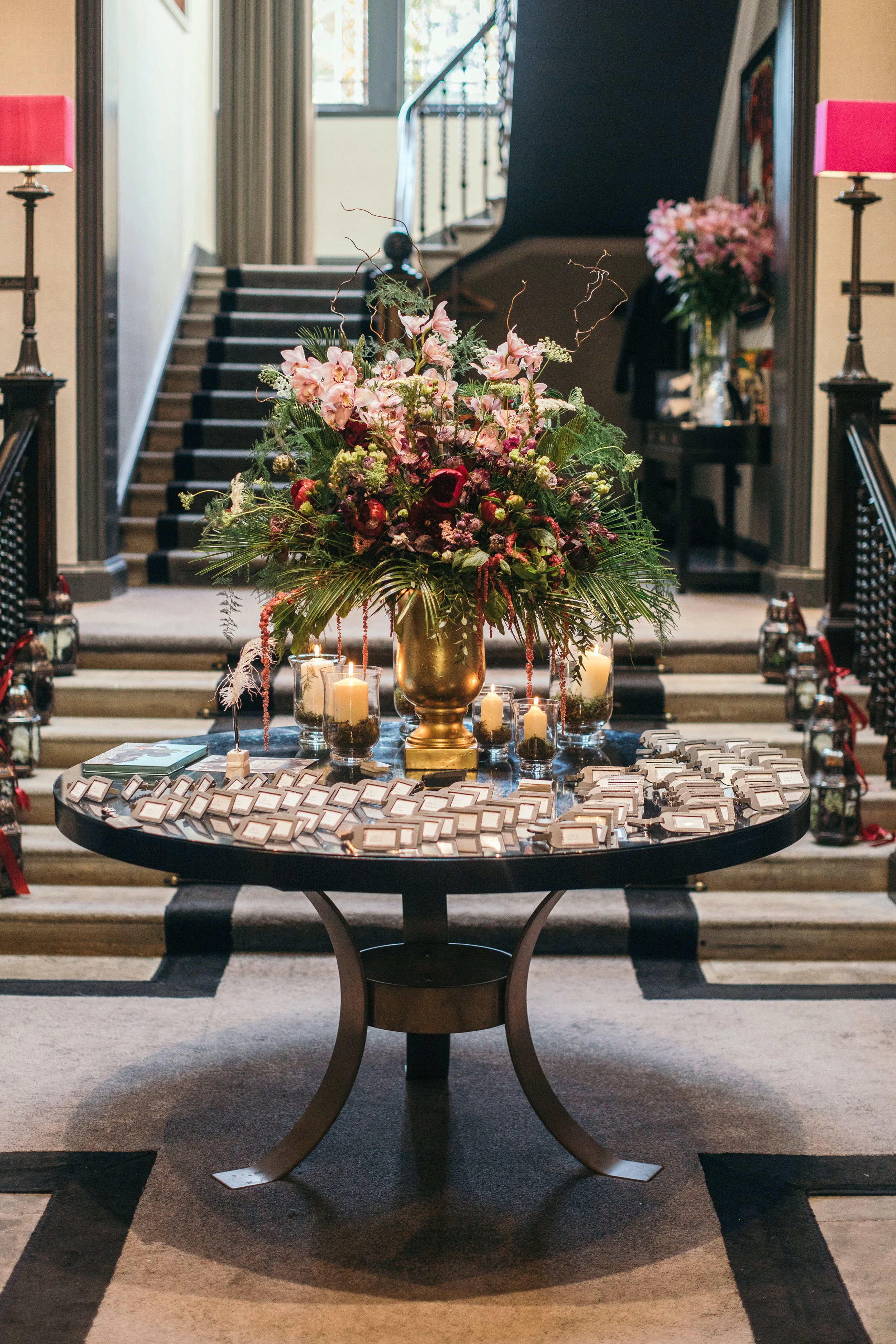 Sustainable flower arrangement and name plates on table in Scotland Castle Outdoor Destination Wedding
