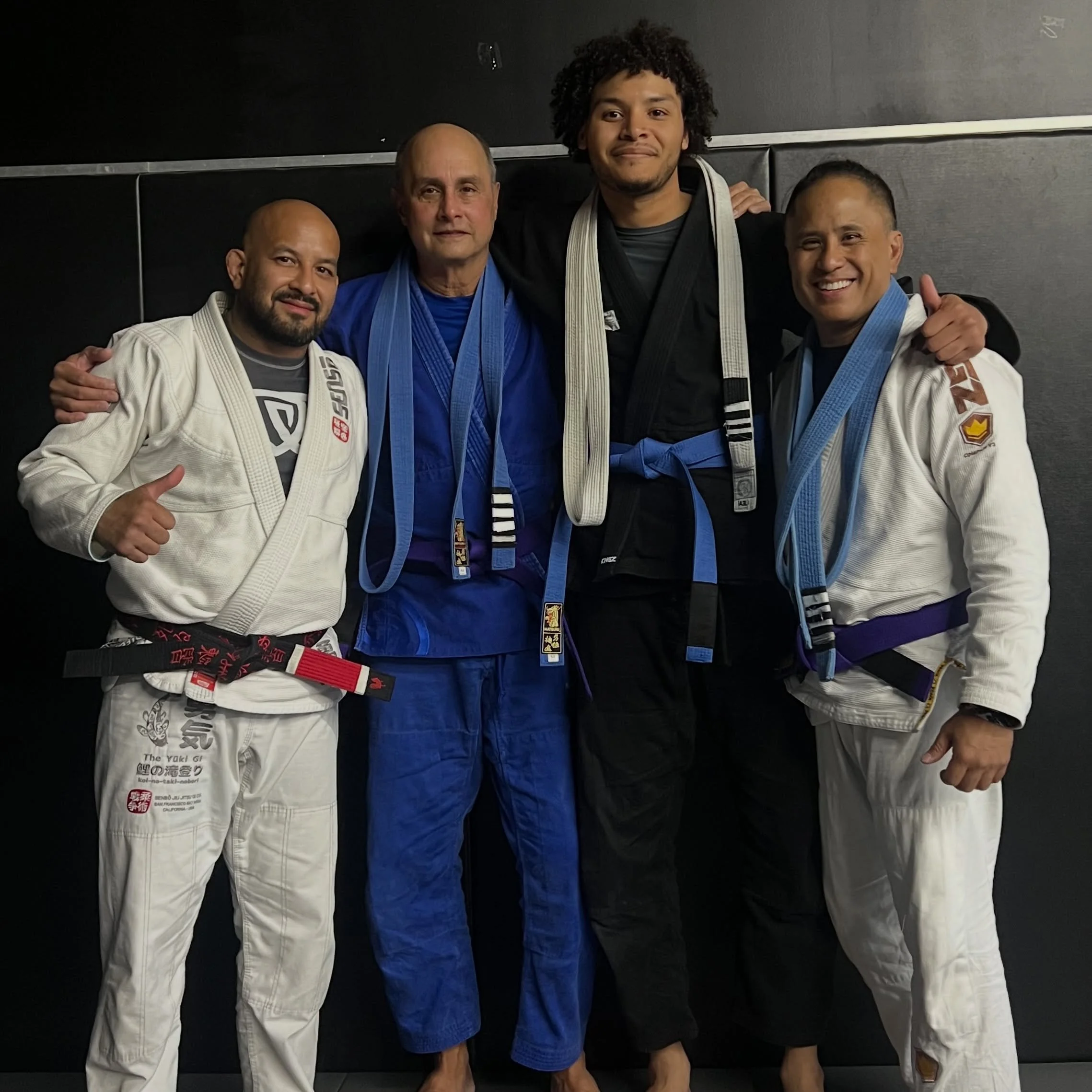 Last night we promoted three students, Fred, Nat and Justin. 
One in his late 20s, one in his mid-50s, and one in his late-60s. 

Different ages. Different paths. Different stories.
But sharing the same mats and making the same decision to keep showi