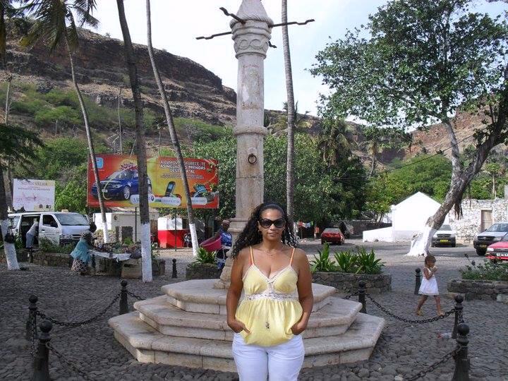 Ann in Cidade Velha (Old City) at the Slave Pillory, Praia, Cabo Verde.