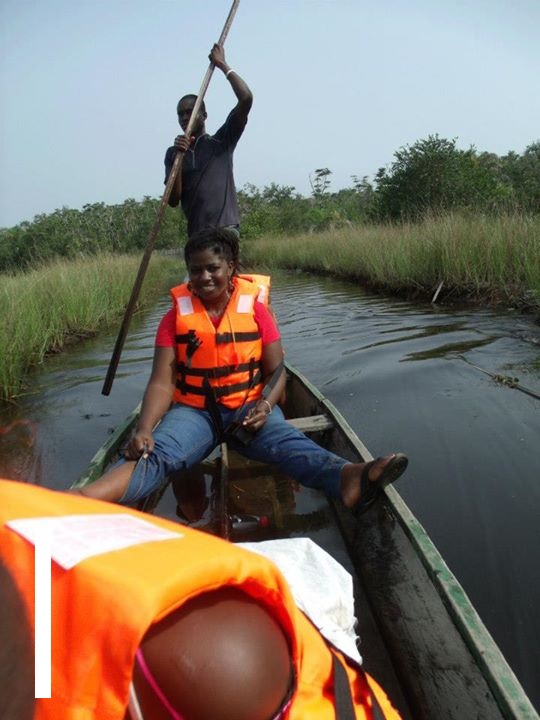 Latoya canoeing through Ghana’s Nzulezo village!