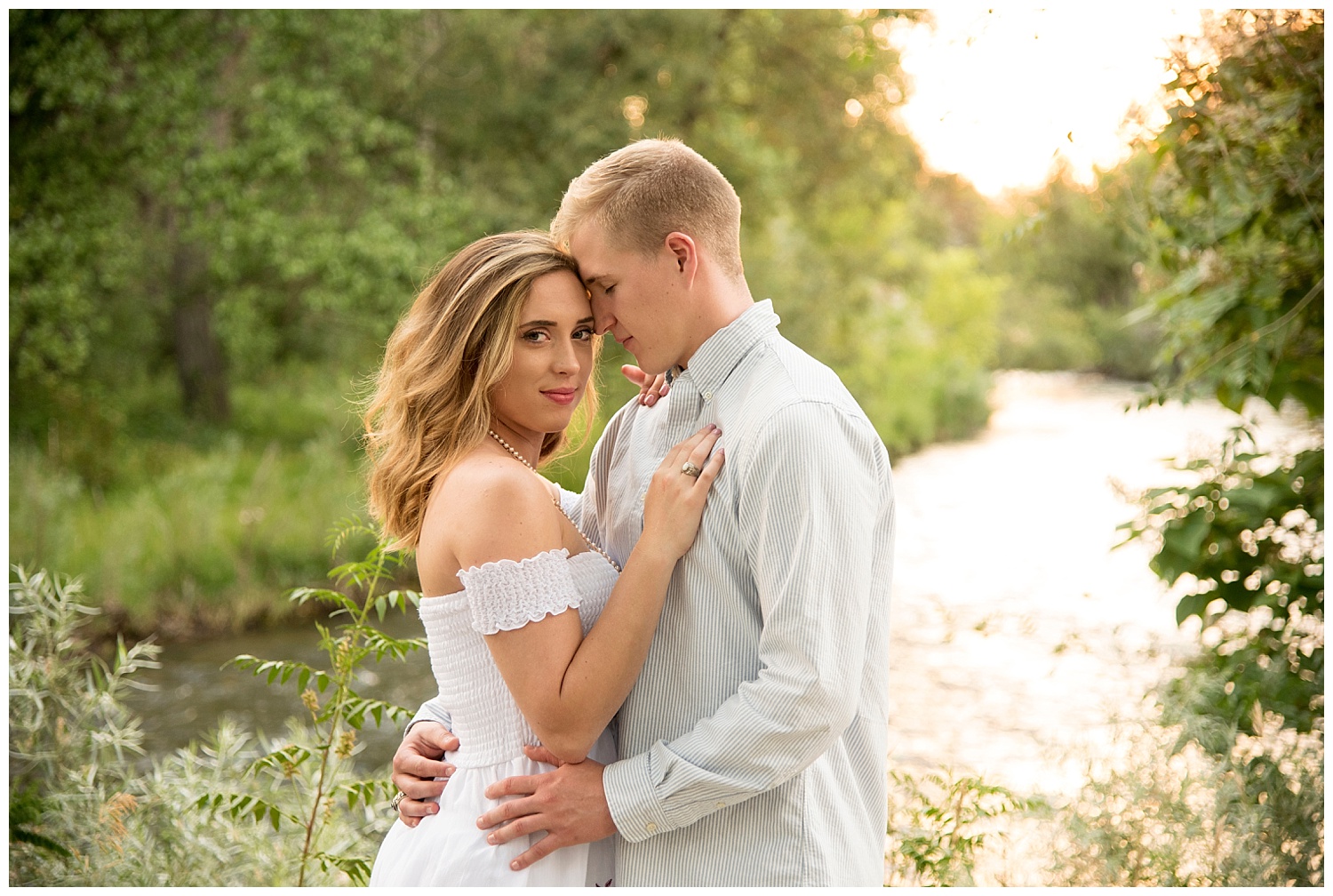 Young Couple Hugging in the Sunset | Clear Creek, Arvada, Colorado | Farm Wedding Photographer | Apollo Fields Wedding Photojournalism