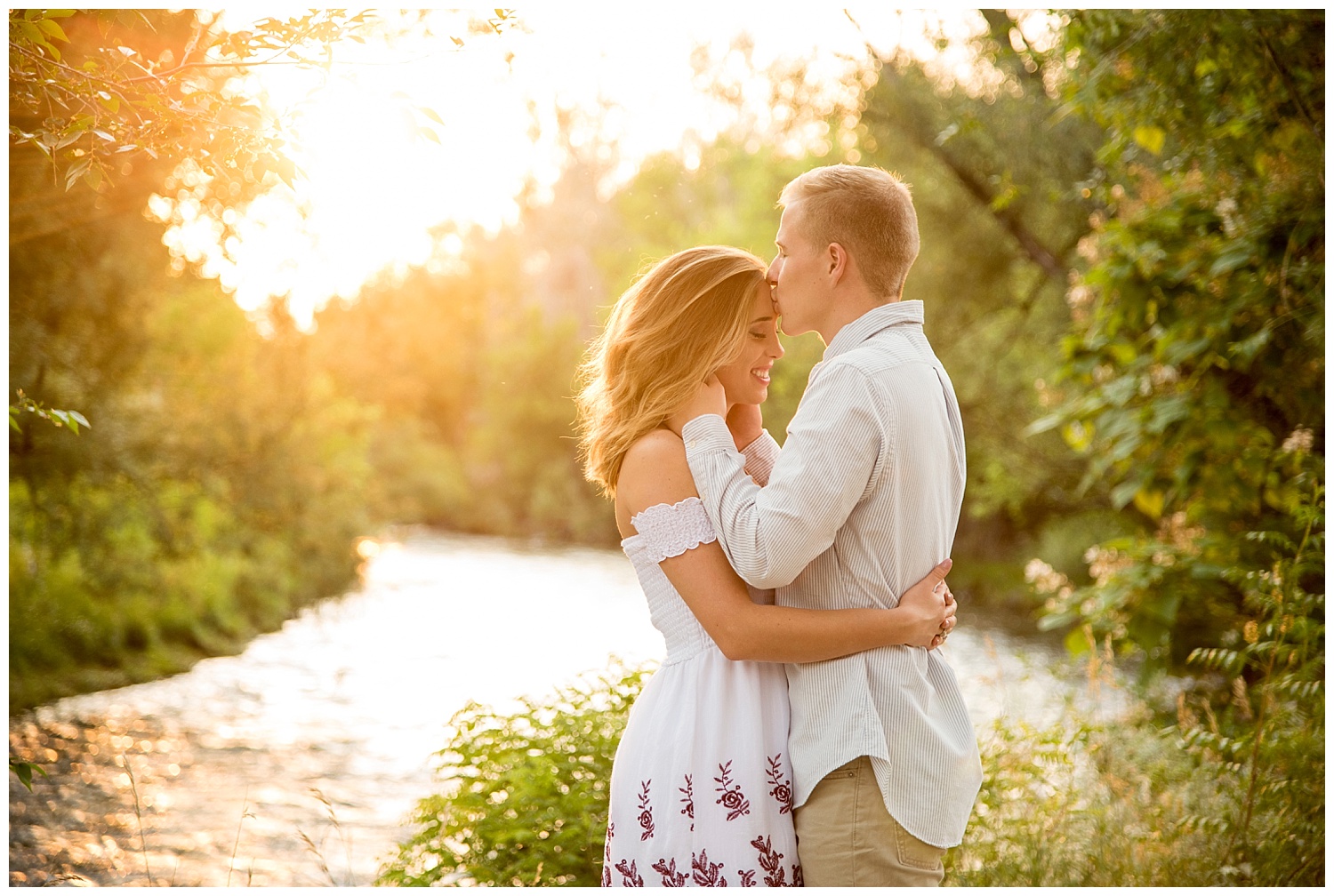 Man Kissing Young Woman on Forehead During Sunset | Mike and Allison's Intimate Engagement Session | Clear Creek, Arvada, Colorado | Farm Wedding Photographer | Apollo Fields Wedding Photojournalism