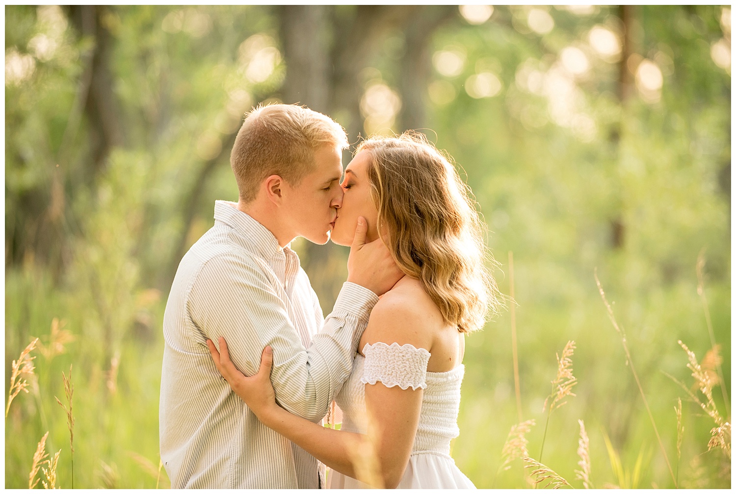 Young Couple Kissing in the Grass during Sunset | Clear Creek, Arvada, Colorado | Farm Wedding Photographer | Apollo Fields Wedding Photojournalism