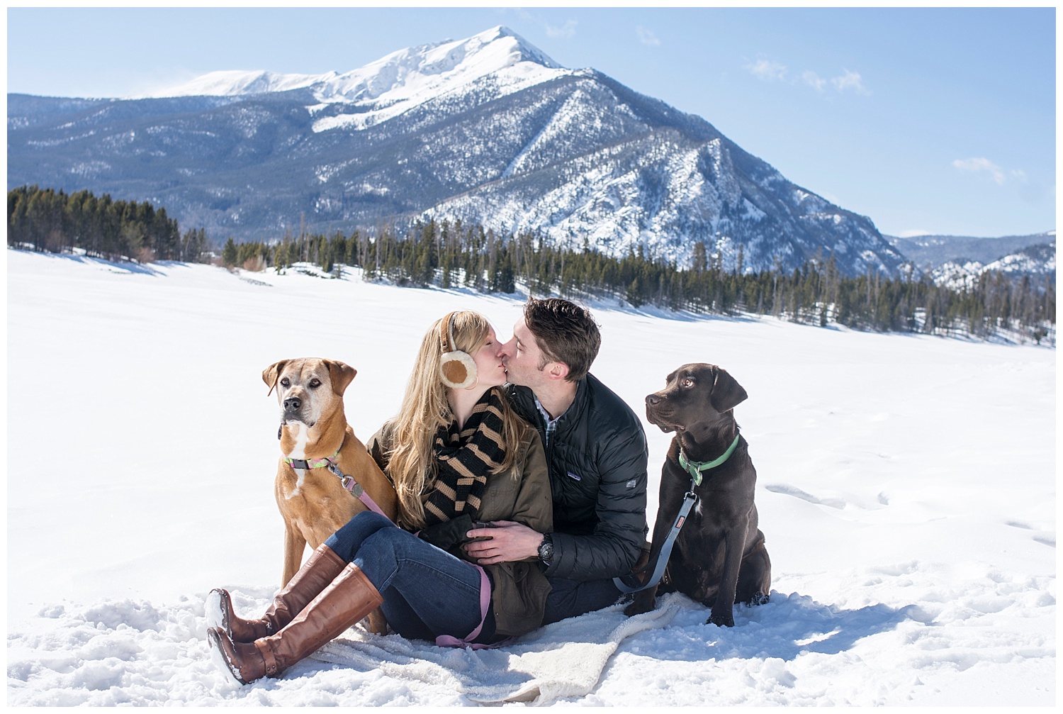 Couple Kissing in the Snow | Lake Dillon Colorado Engagement Photographer | Farm Wedding Photographer | Apollo Fields Wedding Photojournalism