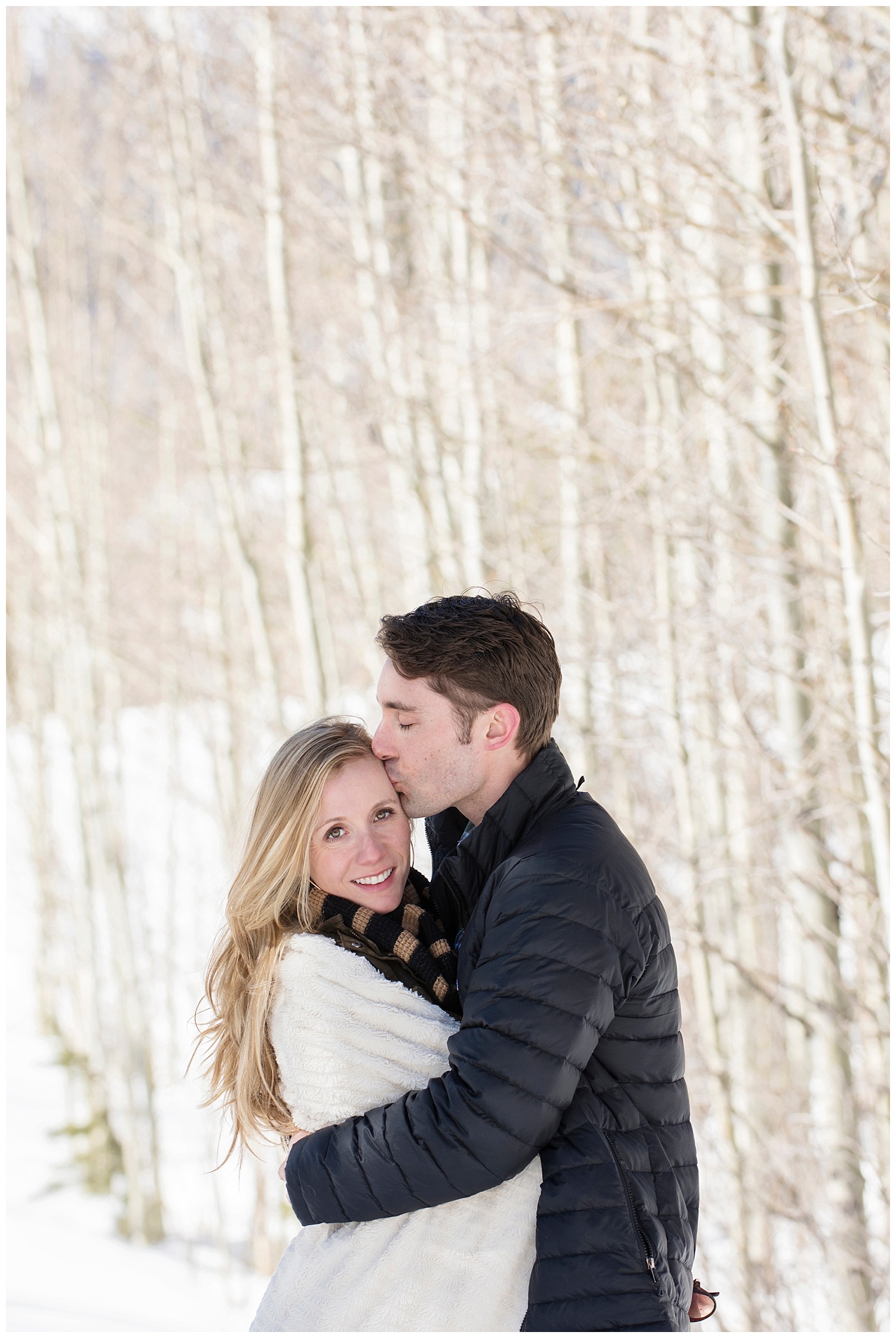 Man Embracing Woman | Lake Dillon Colorado Engagement Photographer | Farm Wedding Photographer | Apollo Fields Wedding Photojournalism 
