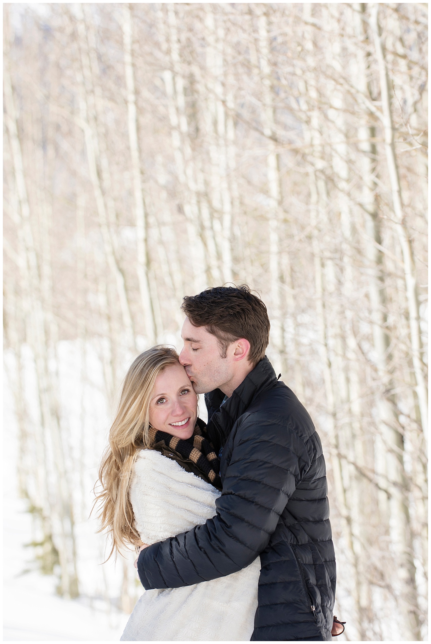 Man Embracing Woman | Lake Dillon Colorado Engagement Photographer | Farm Wedding Photographer | Apollo Fields Wedding Photojournalism