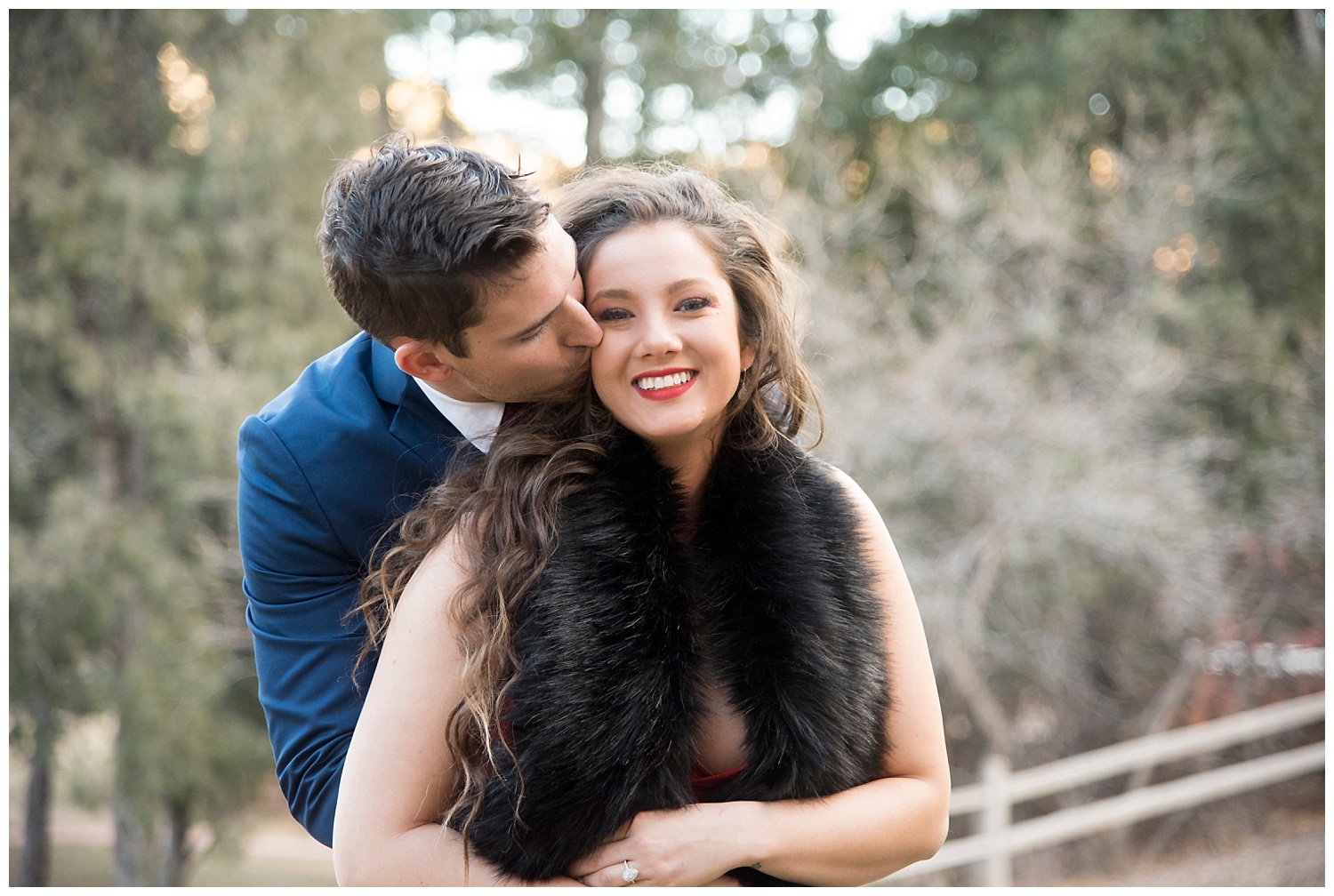 Man Hugging Woman From Behind | Nicholas and Eden's Surprise Proposal at Glen Eyrie Castle | Colorado Springs Photographer | Farm Wedding Photographer | Apollo Fields Wedding Photojournalism