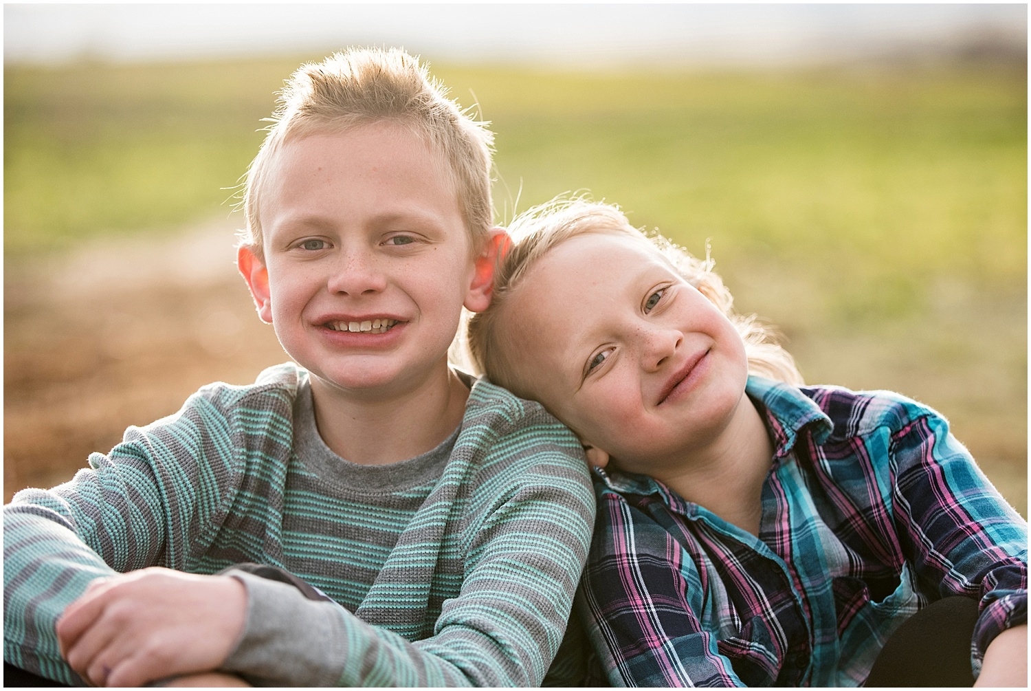 Kids Smiling | Dirt Bike Engagement Session | Colorado Adventure Engagement Photographer | Rocky Mountain Elopement Photography | Farm Wedding Photographer | Apollo Fields Photojournalism