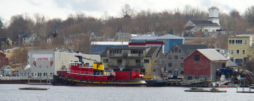 Belfast harbor's signature fixture - red tugboat!