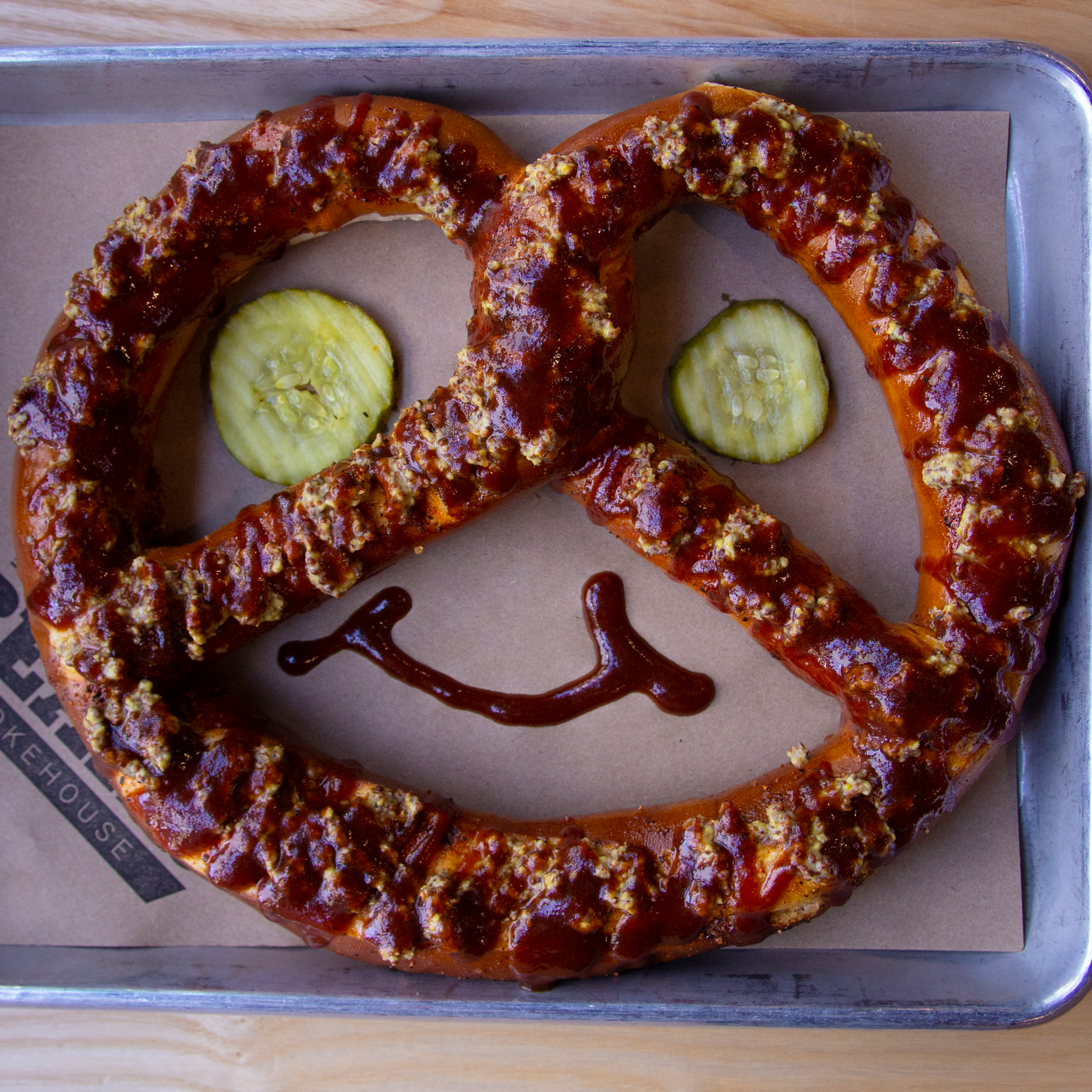 Pretzel - $5 Giant Pretzel served with beer cheese and stone ground mustard