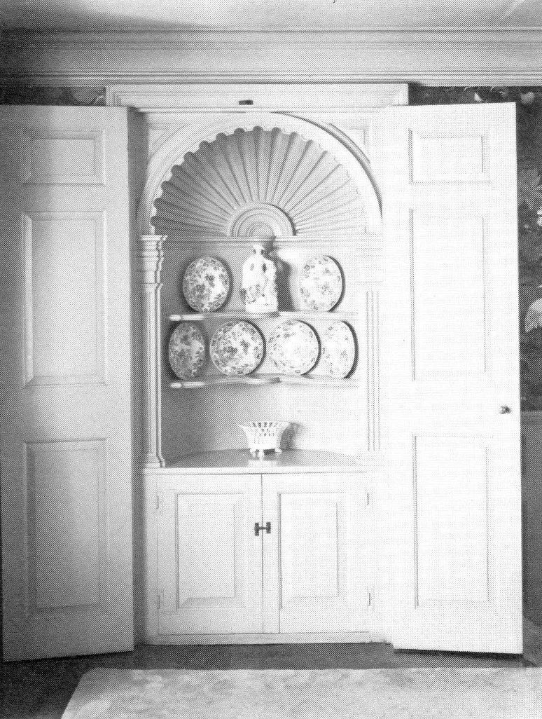 Hand carved shell top cabinet, 1927. Featured in Aurora’s Architectural Heritage.