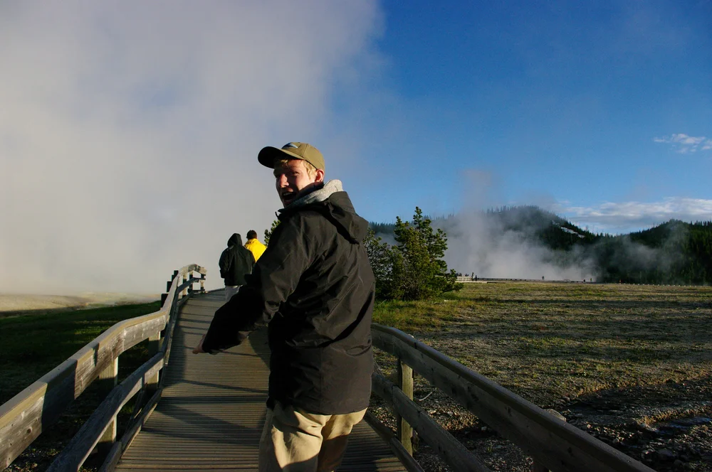 Ike walking toward the Grand Prismatic Spring