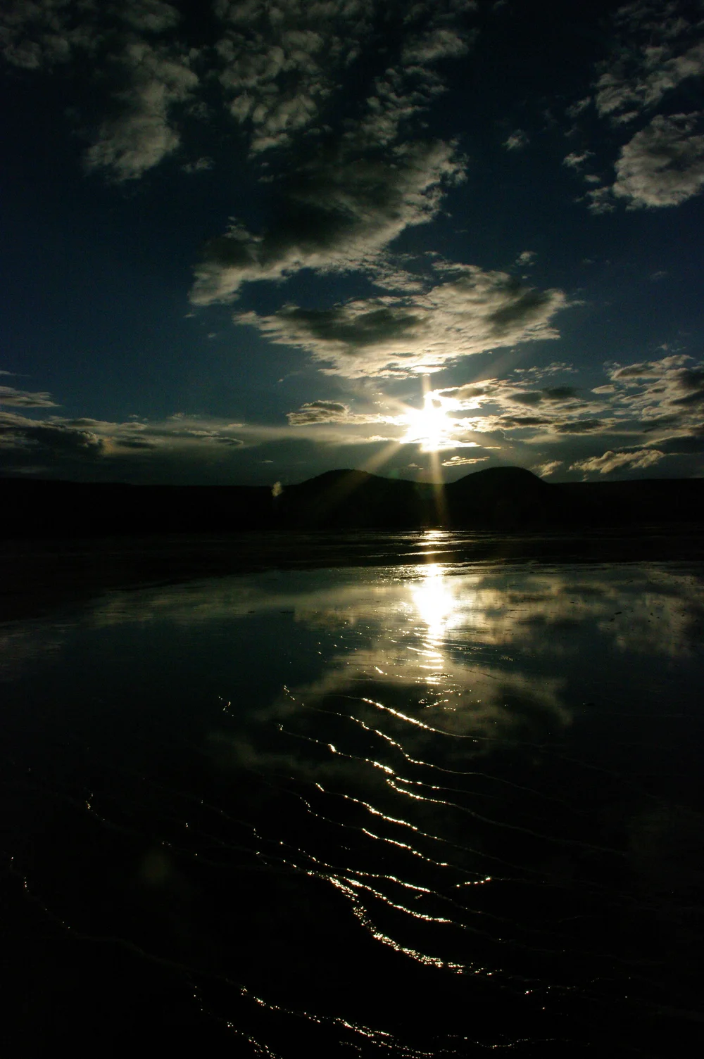 Sun setting over the Grand Prismatic Spring