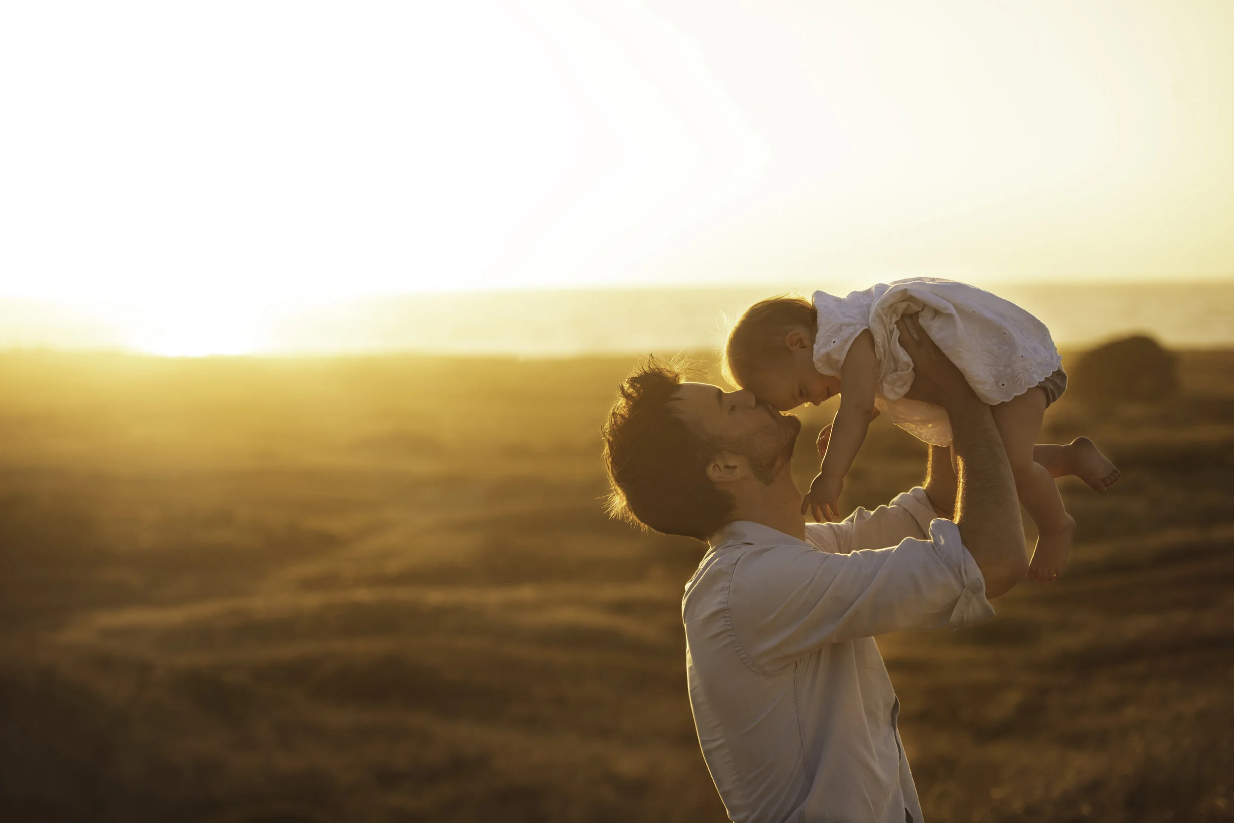 Jersey photographer: father and daughter at St Ouens sunset