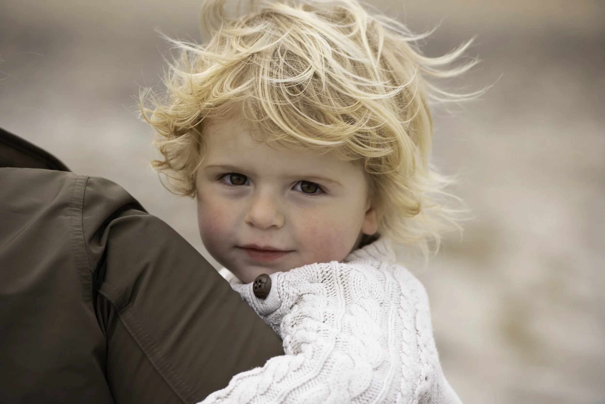 Jersey photographer: windswept boy at beach