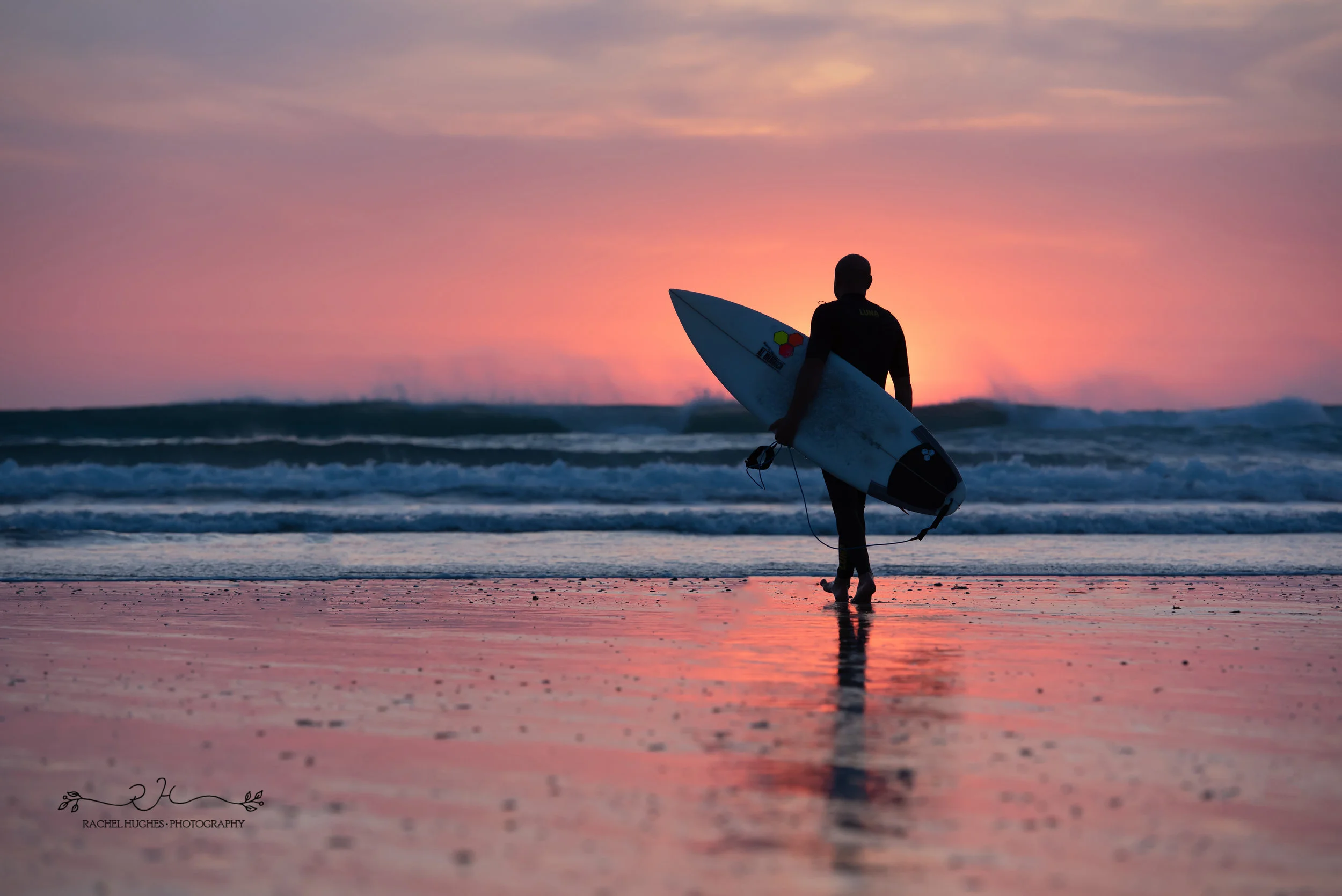 Jersey photographer - surfer at sunset at St Ouens