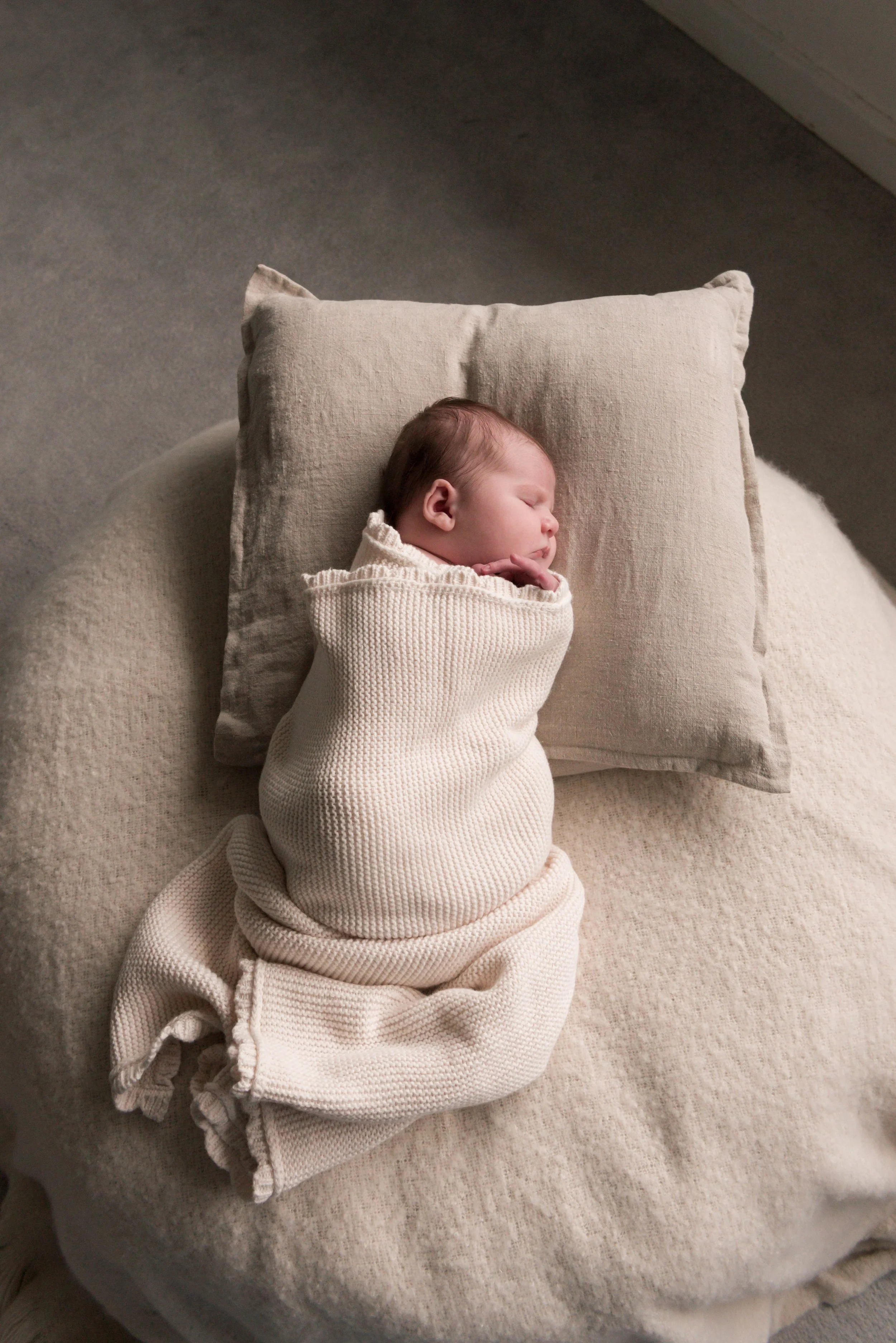Jersey photographer - newborn on posing beanbag at home