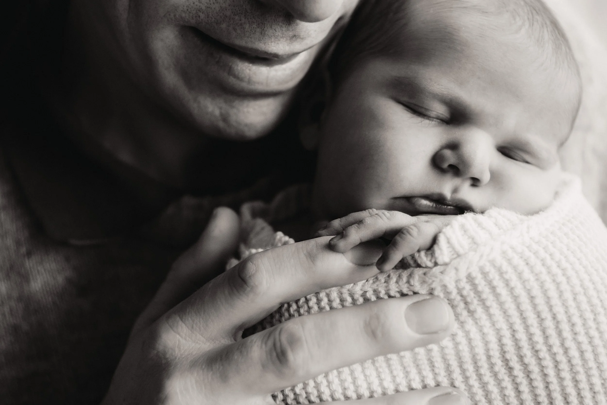 Jersey photographer - newborn baby holding fathers fingers