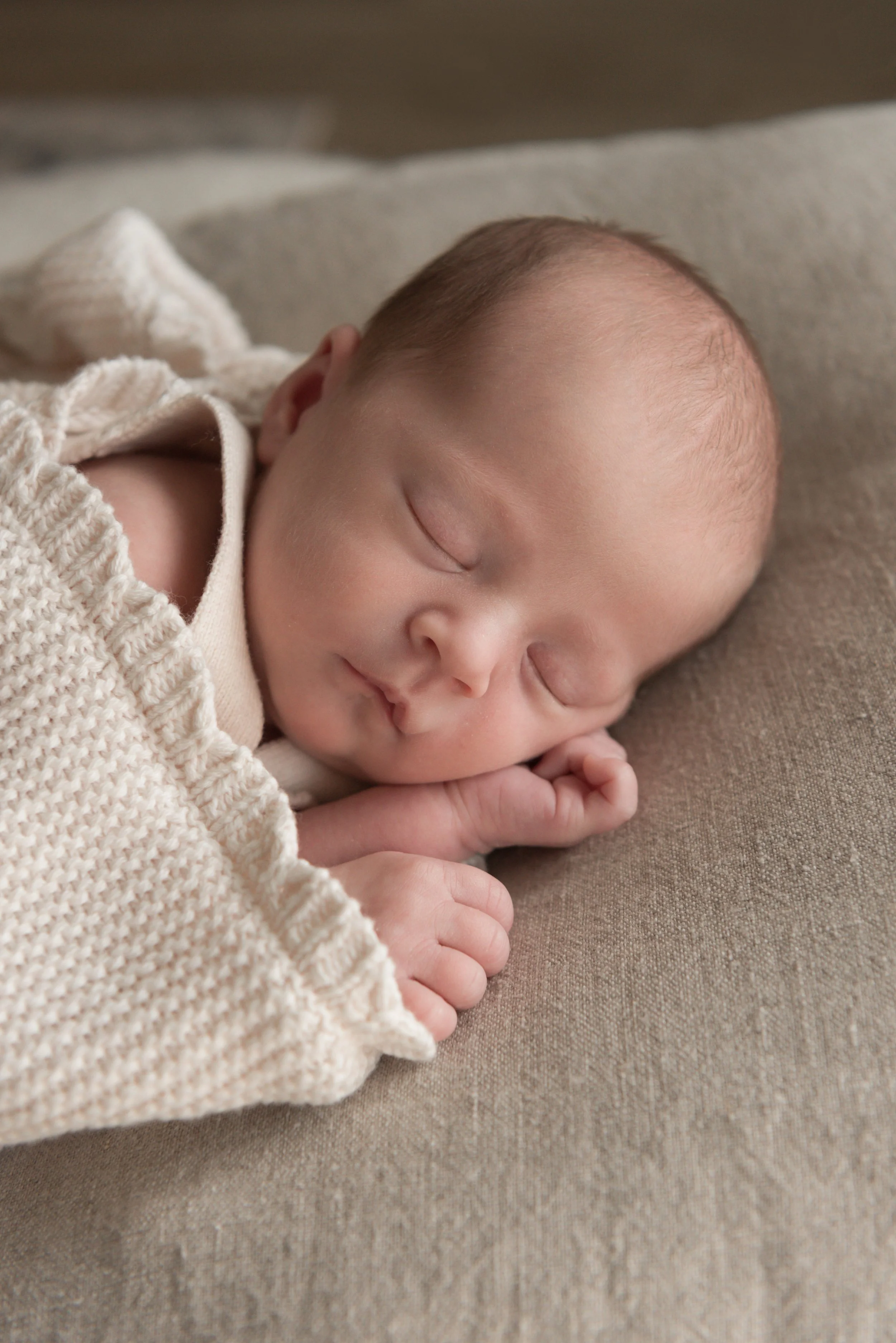 Jersey photographer - newborn girl at home on posing beanbag