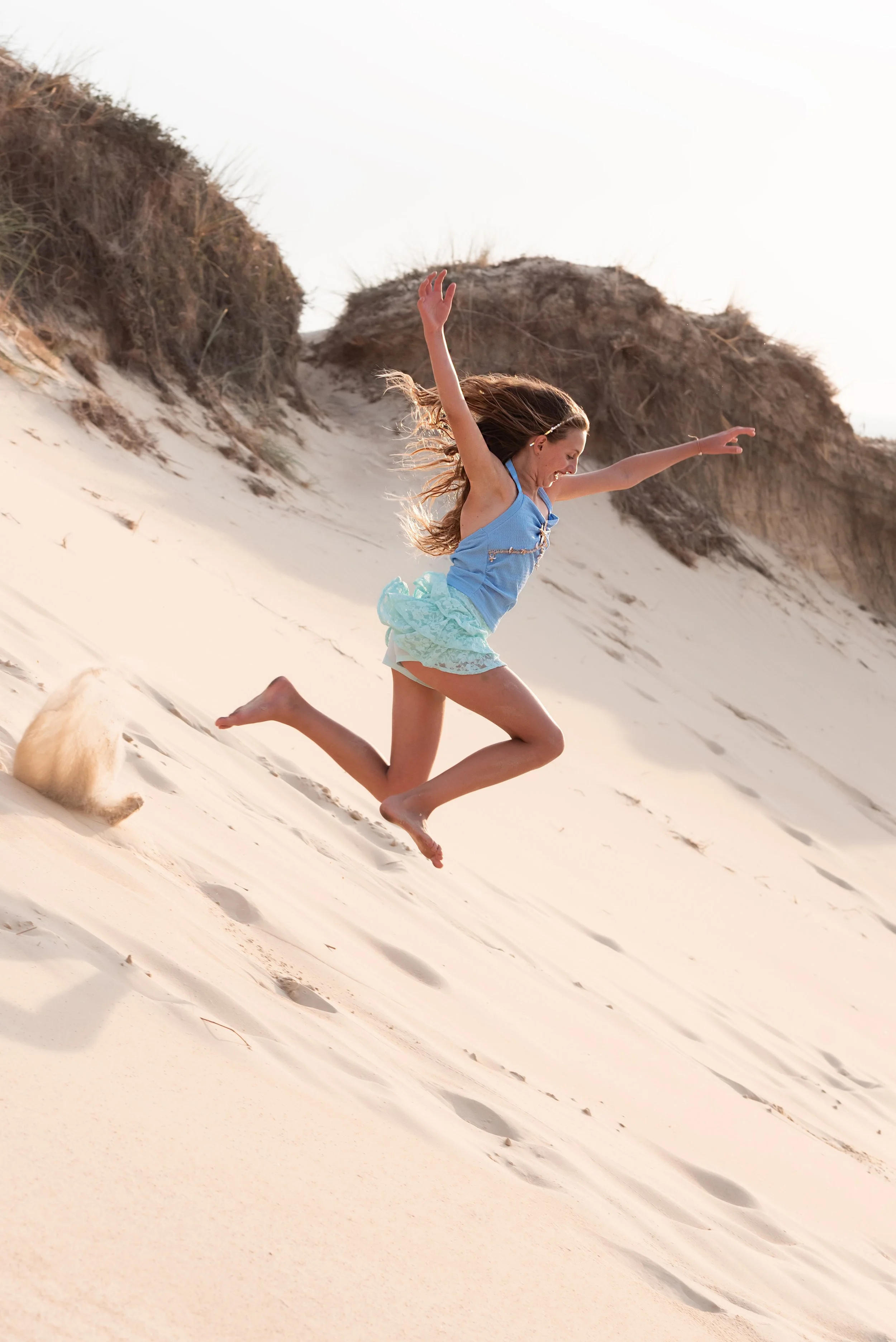 Jersey photographer - girl running down dune