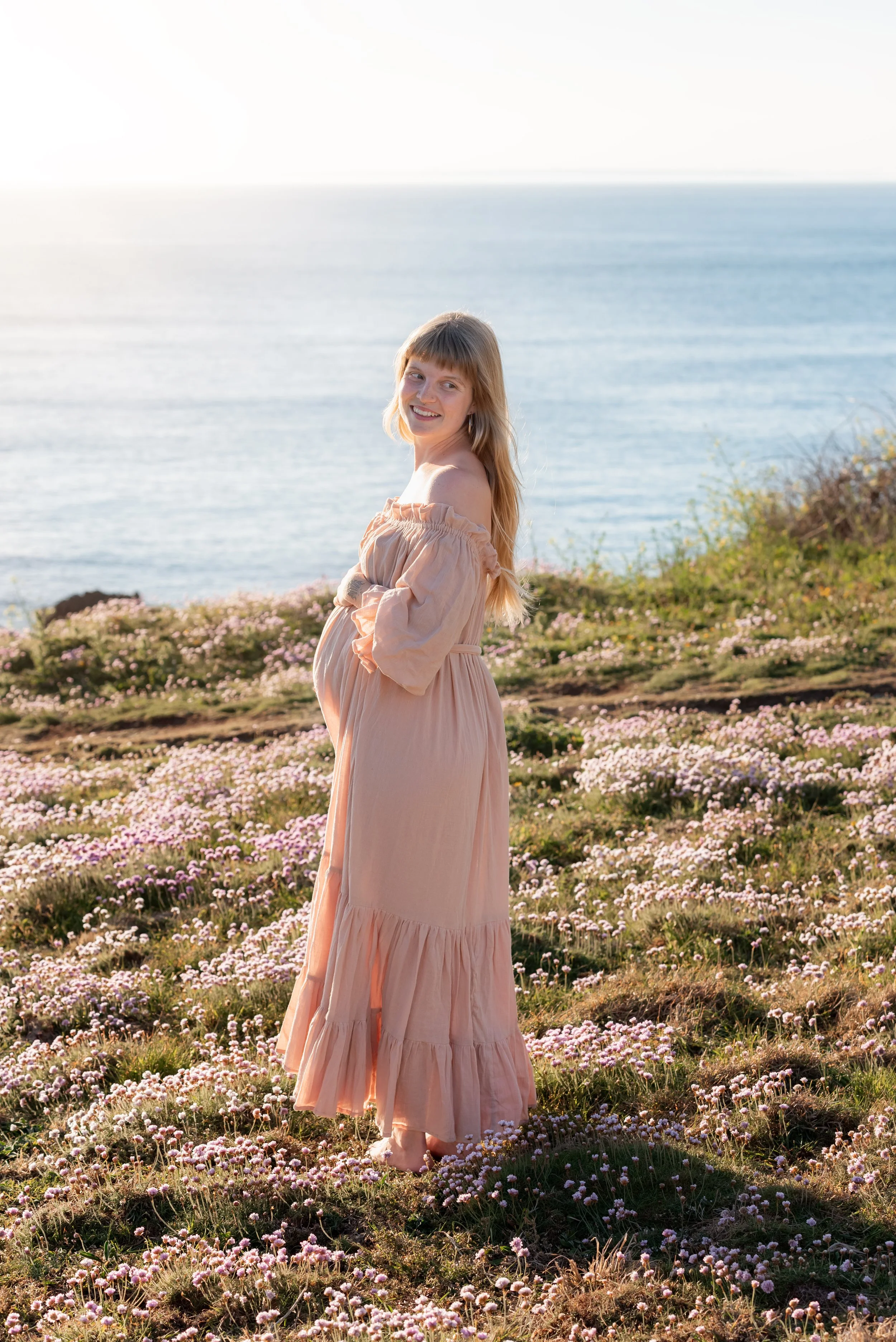 Jersey photographer - maternity photoshoot in coastal flowers
