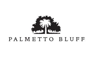 Logo of Palmetto Bluff with a stylized tree above the text.
