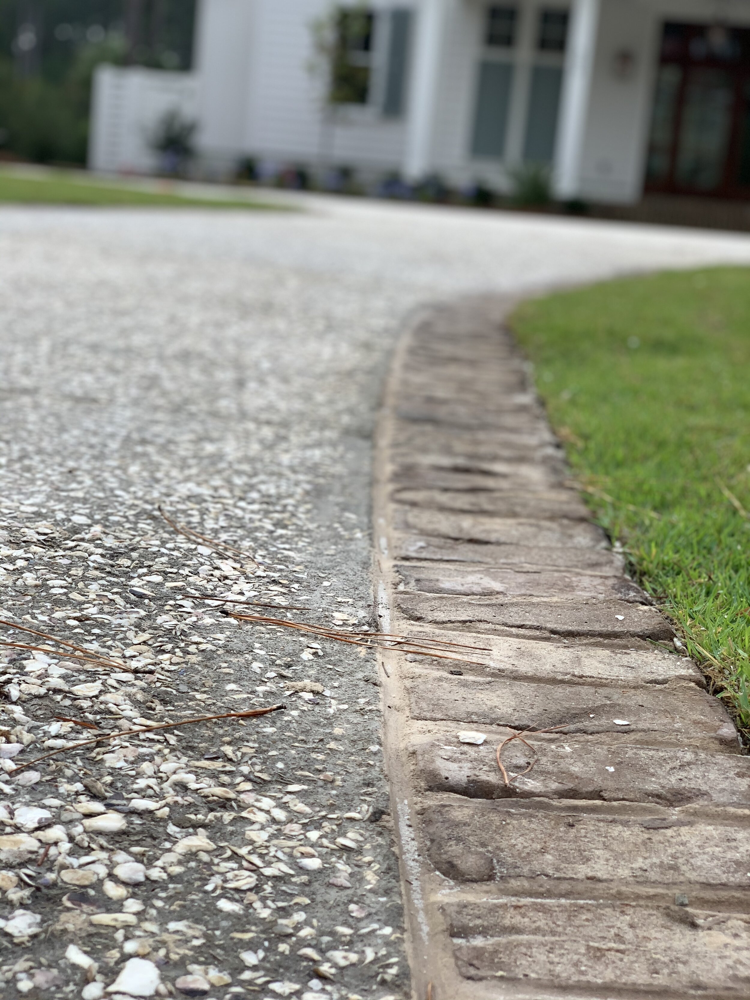 Crushed Oyster Shell Driveway with Brick Edging.jpg